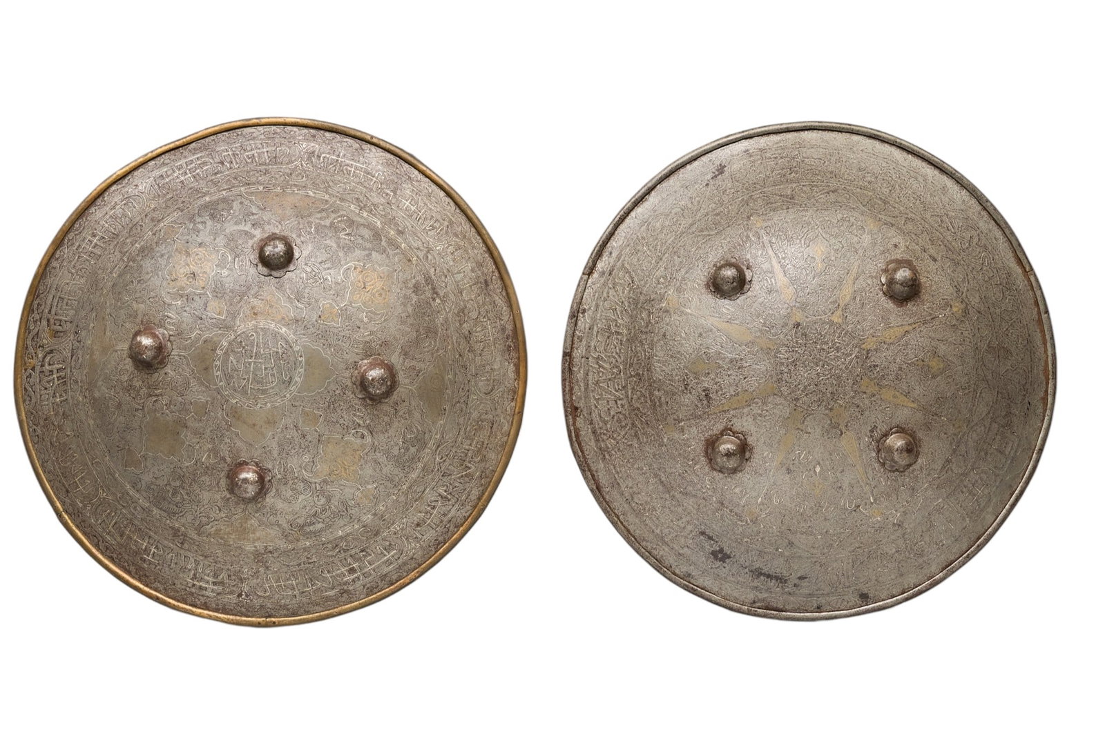 Red McCombs | Pair of Indo Persian Shields: Pair of Indo Persian round metal shields, circa 1800s diameter 18 in. x depth 6.5 in. Provenance: Property from the personal estate collection of iconic Texas businessman, civic leader and 