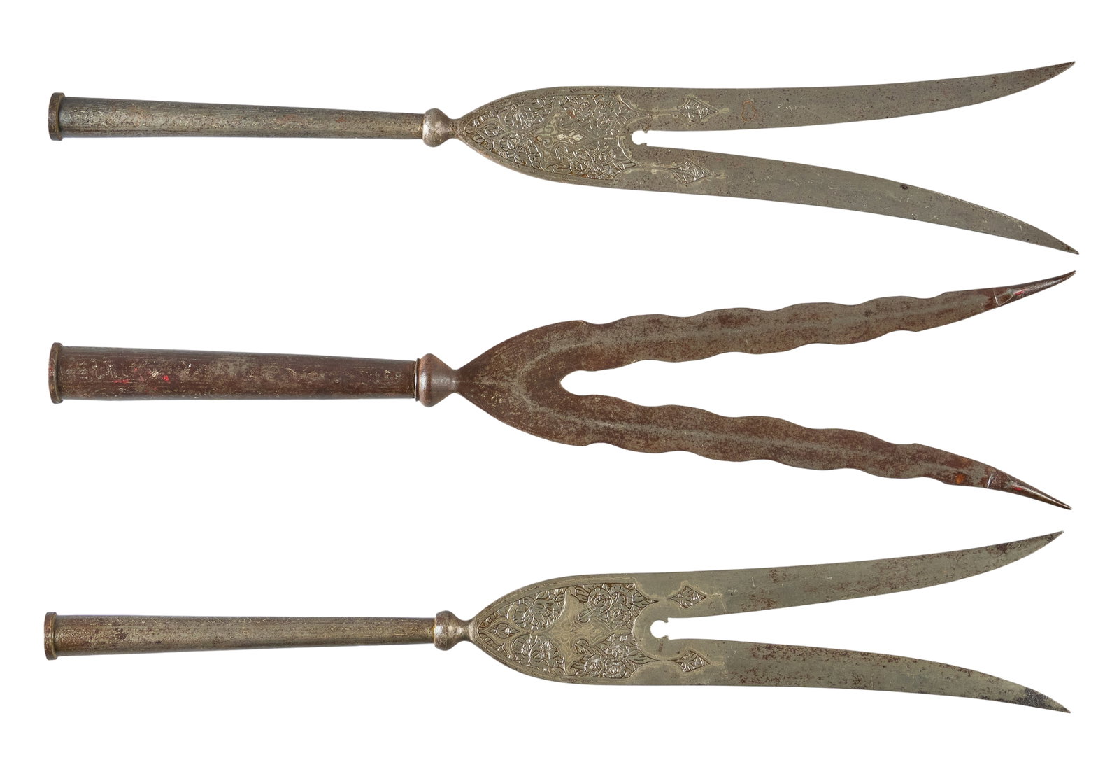 Red McCombs | Collection of Three Indo-Persian Bridle Cutter Spear Points: Collection of 3 17th century Indo-Persion bridle cutter spear heads; two have silver inlay & engraving OAL: 22 in. Condition commensurate with age Provenance: Property from the personal estate col