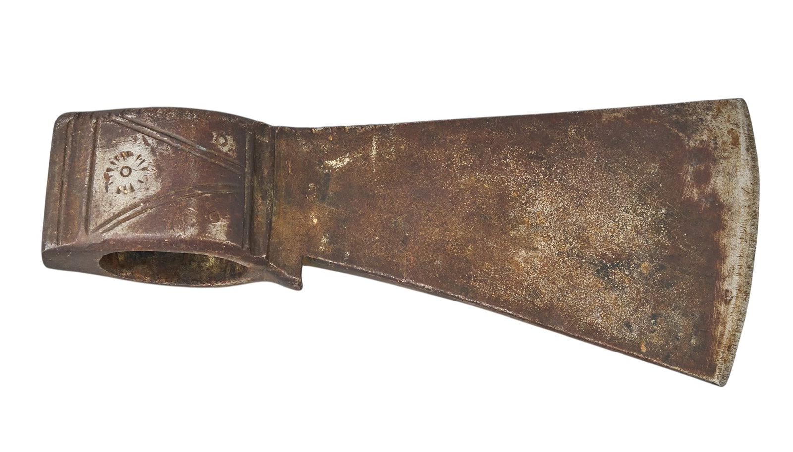 Red McCombs | Native American Tomahawk Head: Antique iron Native American tomahawk head with starburst motifs length 5 in. x width 2.5 in. Provenance: Property from the personal estate collection of iconic Texas businessman, civic leader