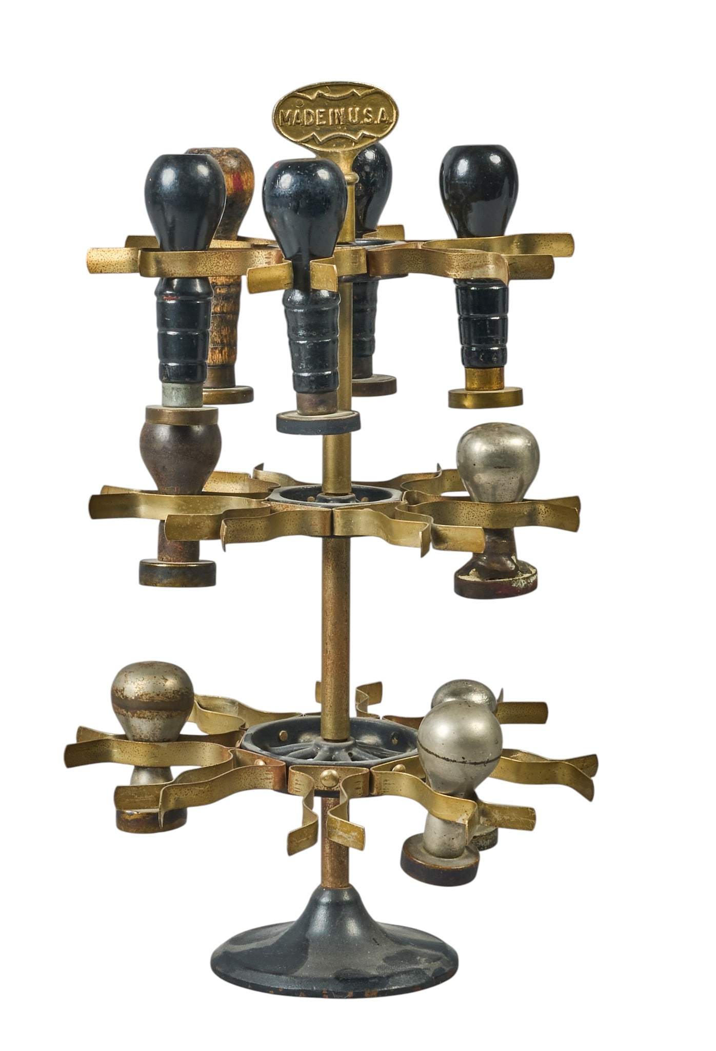 Red McCombs | (10) Vintage Location Stamps with Stand: Collection of ten location stamps on original swivel stand, most originating from the American mid-west, circa late 19th century, includes various companies including Wells Fargo height 13 in. x width