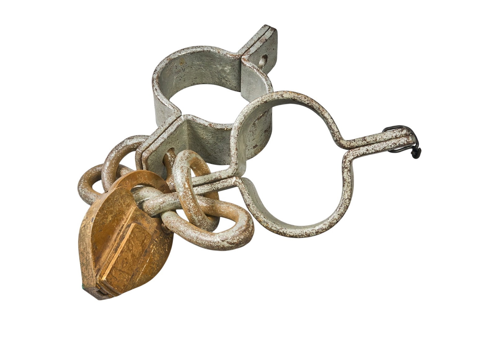 Red McCombs | US BIA Lock & Shackles: United States Bureau of Indian Affairs shackles and lock, marked "US. B.I.A." length 21.75 in. x width 4.25 in. x depth 4 in. Provenance: Property from the personal estate co
