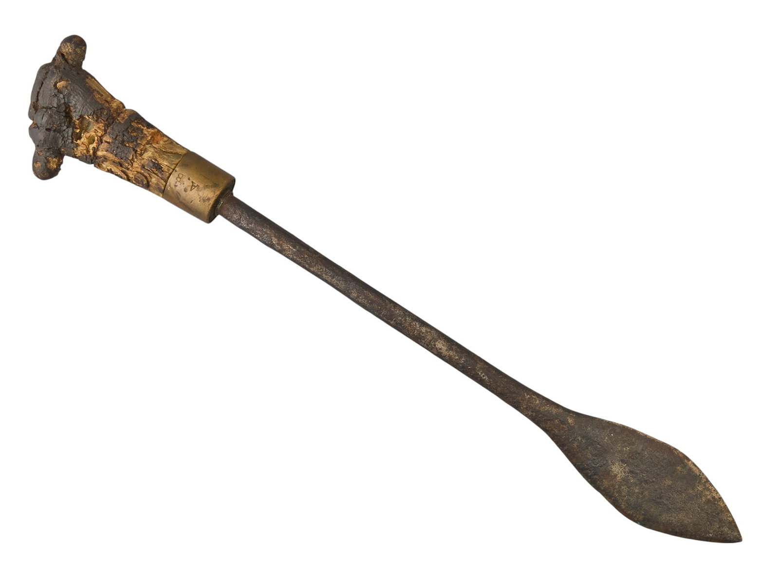 Red McCombs | Inuit Hand-Carved Dagger: Antique Inuit dagger with hand-carved handle depicting fist, with brass collar marked with initials "A.B" length: 12.5 in. Provenance: Property from the personal estate collectio