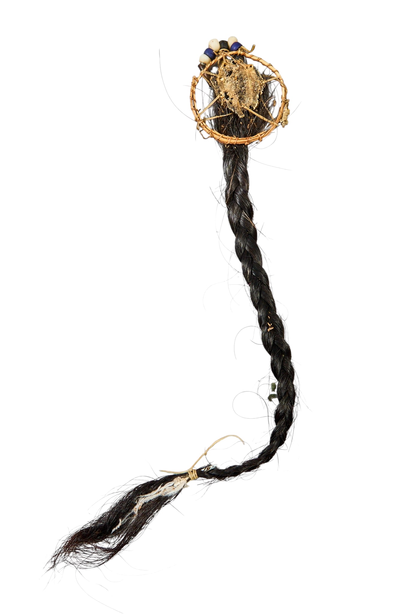 Red McCombs | Hair Lock: Hair lock, possibly horse, with some trade beads and feathers, circa 19th century length 17 in. Provenance: Property from the personal estate collection of iconic Texas businessman, civic leader and p