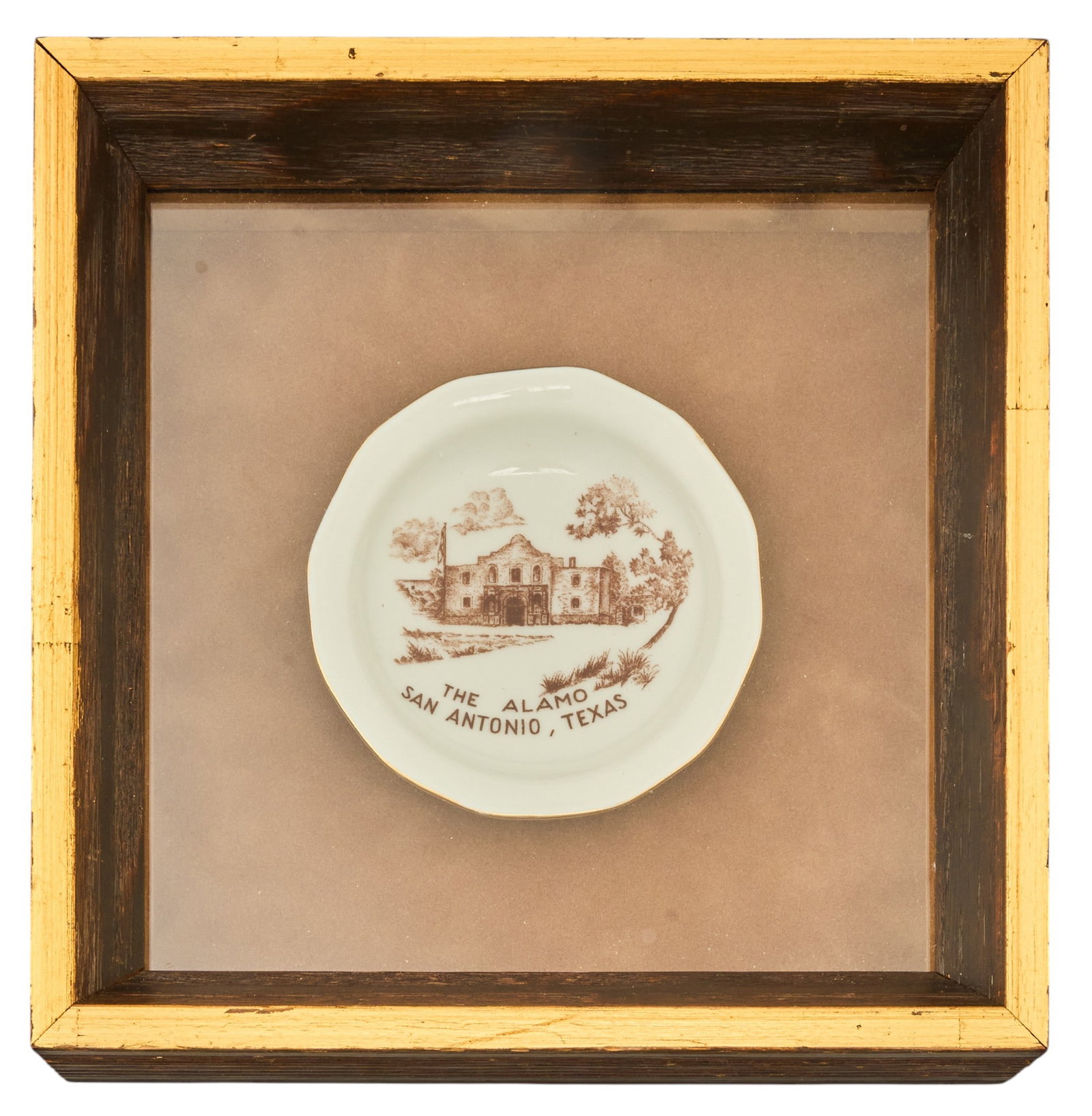 Red McCombs | Alamo Souvenir: Alamo souvenir, framed German porcelain dish with hand-painted Alamo motif height 7 in. x width 7 in. x depth 1.75 in. / frame Provenance: Property from the personal estate collection of iconic Texas 