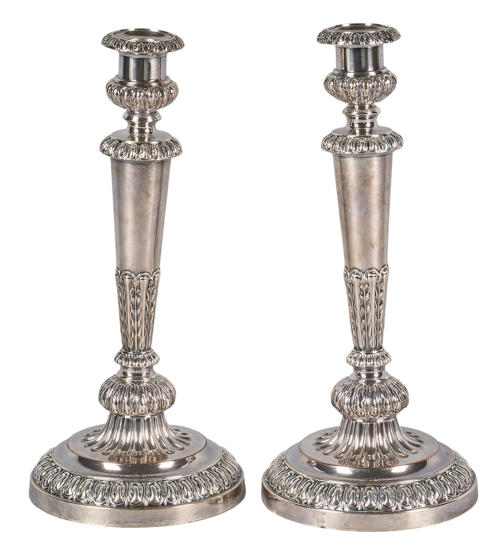 Red McCombs | Pair of Matthew Boulton Victorian Silverplate Candlesticks: Pair of Victorian silverplate candlesticks by Matthew Boulton, Birmingham, with tapering fluted shafts, repoussé design, on circular bases, hallmarked with double sun height 14 in. x diame