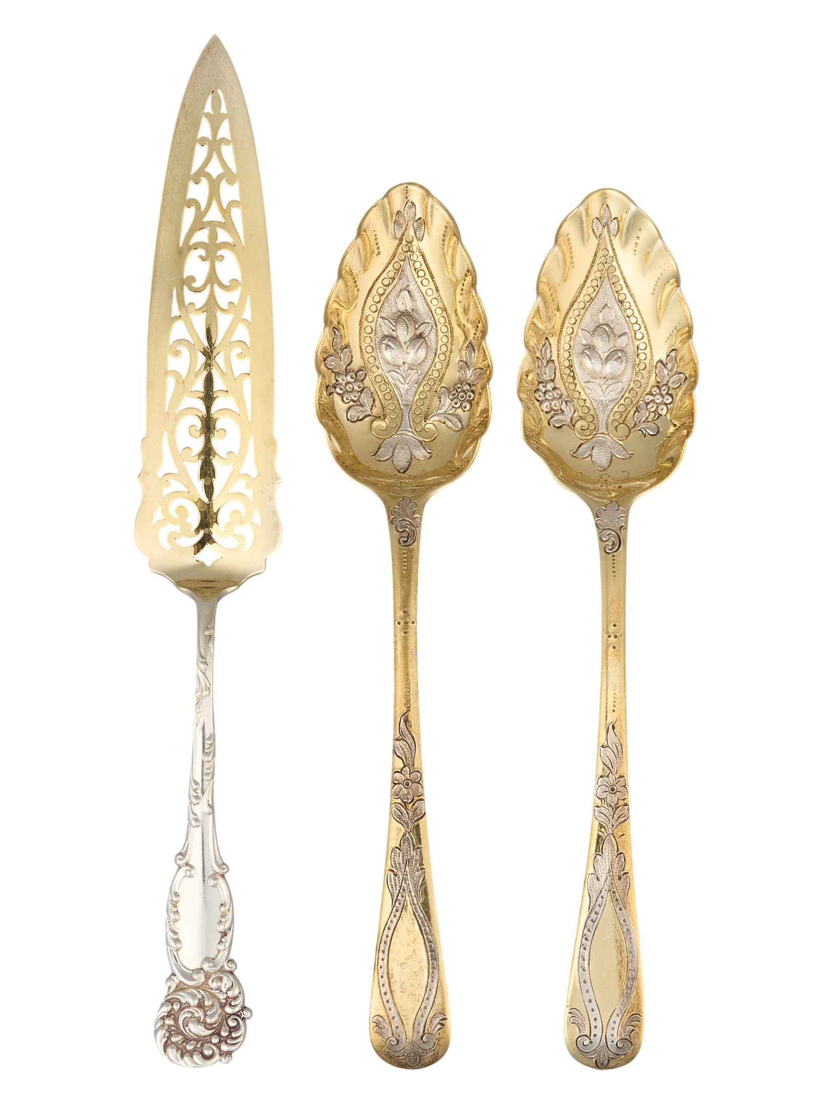 Red McCombs | Antique English Sterling Silver Gilt Flatware: Antique English sterling silver gilt flatware, to include a pierced cake server and pair of repousse fruit spoons, hallmarked Length: 10 in. / longest Total weight: 6.1 ozt