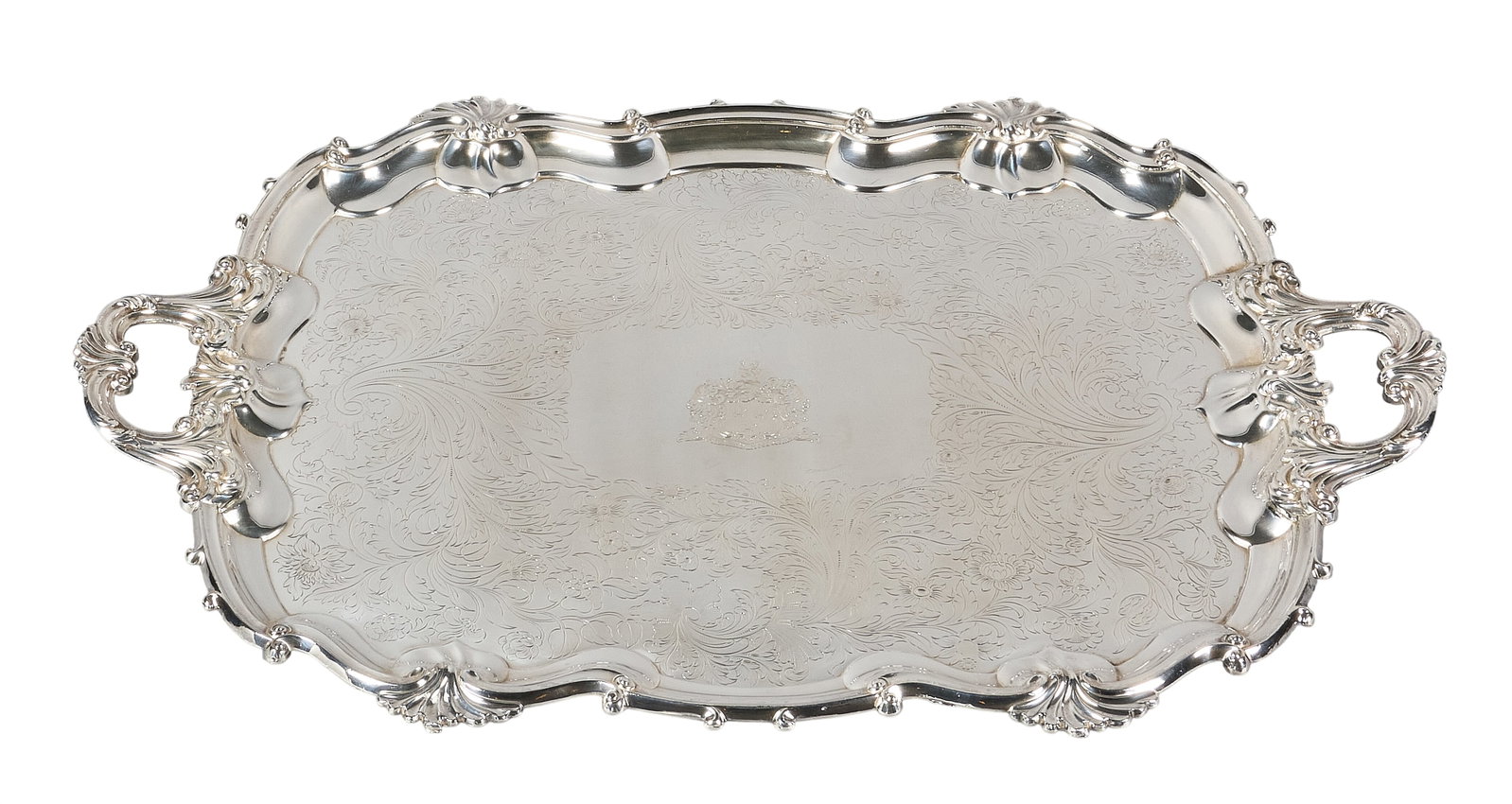 Red McCombs | Victorian Sheffield Silverplate Service Tray: Victorian Sheffield silverplate service tray, featuring a scalloped rim embellished with foliate chasing and "Floreat Majestas" center armorial, rolled plate, 1860–70 height 2 in.