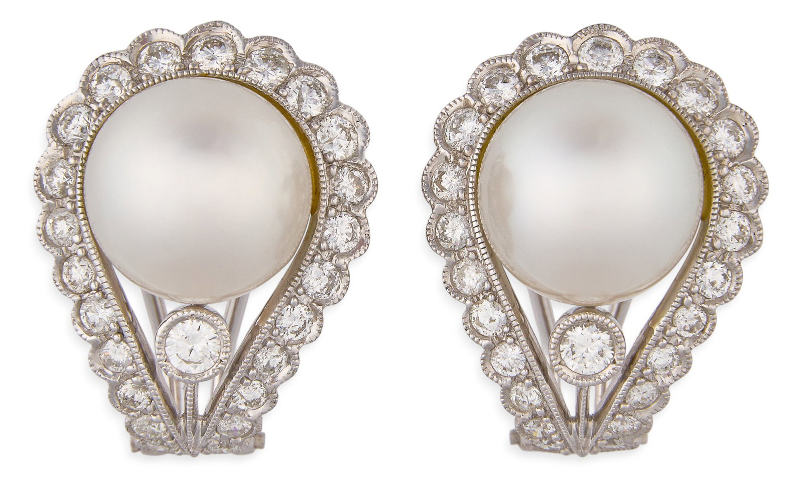 Red McCombs | 18K Pearl Diamond Earrings: Pair of 18K white gold clip-on earrings set with 12-13 mm white pearl, accented by halo of round brilliant-cut diamonds, in reticulated half hoop design Size: 1 in. / length Total 