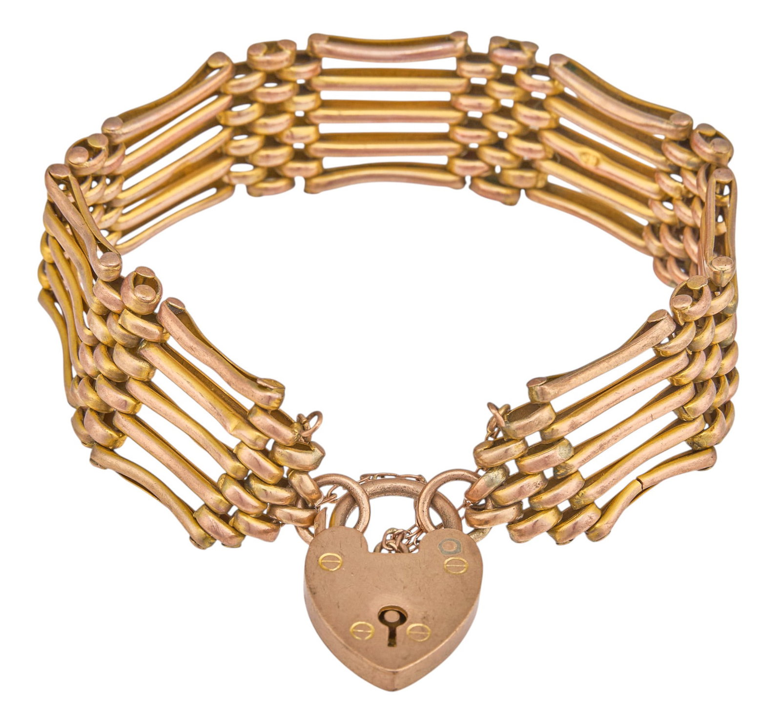 Red McCombs | Antique English 9K Heart Padlock Bracelet: Antique English 9K yellow gold gate link bracelet, set with a heart-shaped padlock charm, safety chain, and faux key with spring hasp padlock, hallmarked "B&S 9CT" Length: 7.25 in. Total