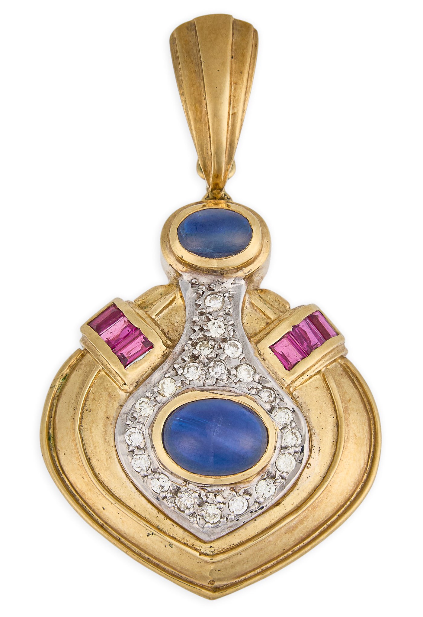 Red McCombs | 14K Sapphire Diamond Ruby Pendant: 14K gold pendant set with two sapphire oval cabochons, pave set round brilliant-cut diamonds, and baguette-cut faceted rubies, with a hinged bail Size: 1.25 in. x 1 in. Total weight: 8.1 g Provenance: