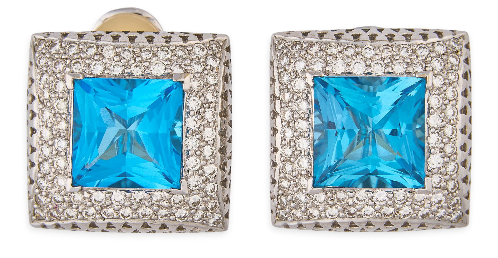Red McCombs | 18K Blue Topaz Earrings: Pair of 18K white gold earrings centering dimensional fancy cut London blue topaz, surrounded by round brilliant-cut pave diamonds, featuring hinged posts and convertible French clips S