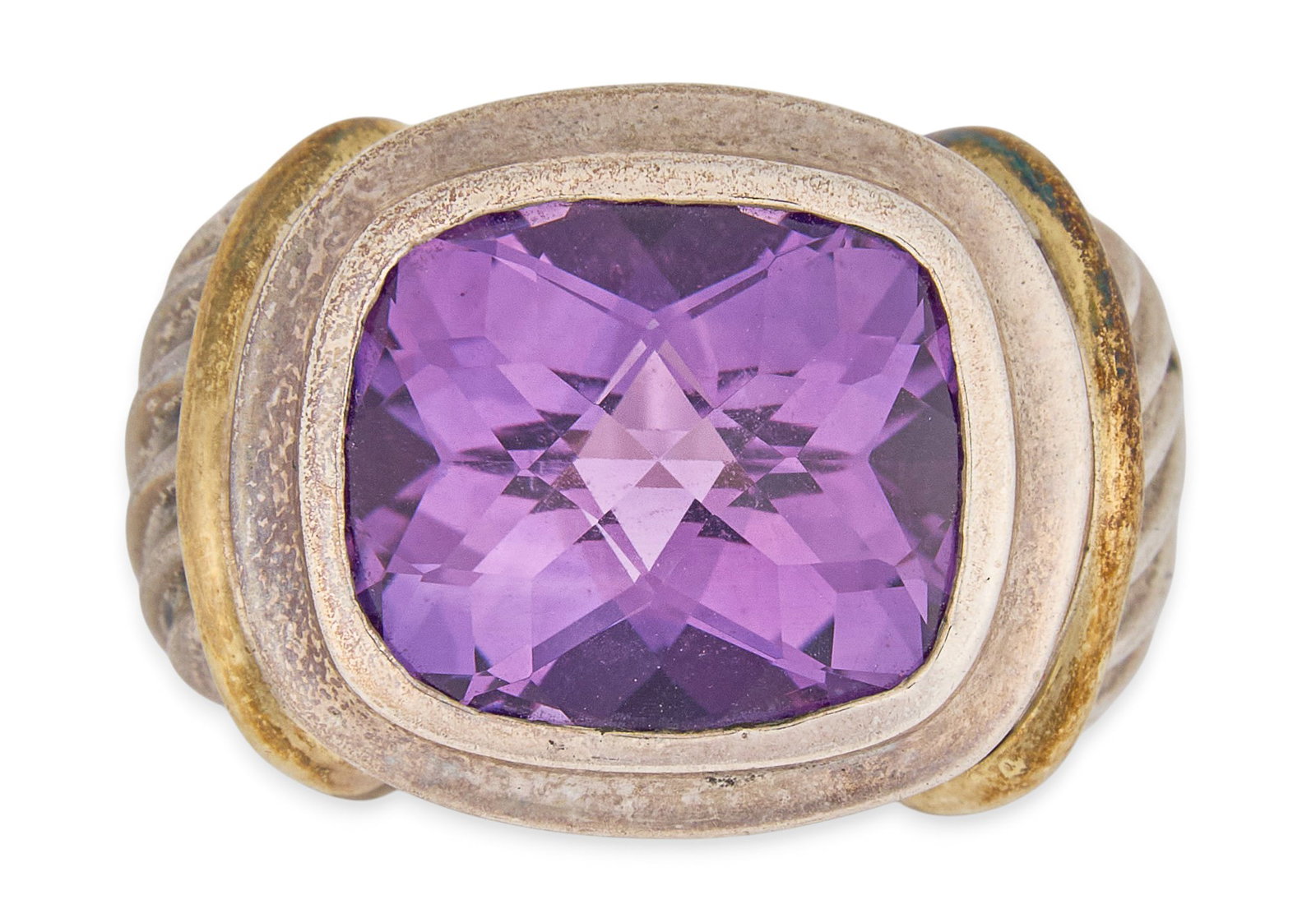 Red McCombs | David Yurman 14K/Sterling Amethyst Ring: David Yurman sterling silver and 14K yellow gold ring, set with a step-cut amethyst in a bezel setting, cable design to shank, marked "Yurman ©" and "14K 925" Size: 5 Total we