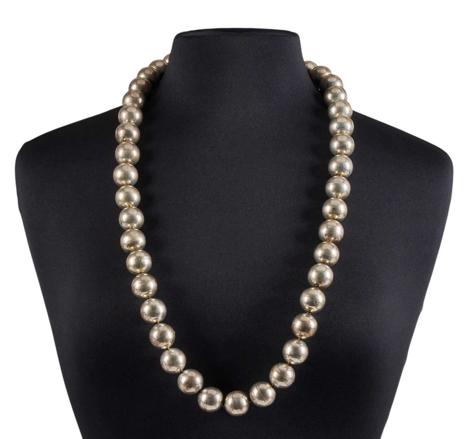 Red McCombs | Mexican Sterling Silver Necklace: Mexican sterling silver beaded necklace, composed of round sterling beads and open box clasp, marked "925 TC-00" Length: 34 in. Total weight: 5.935 ozt Provenance: Property from the per