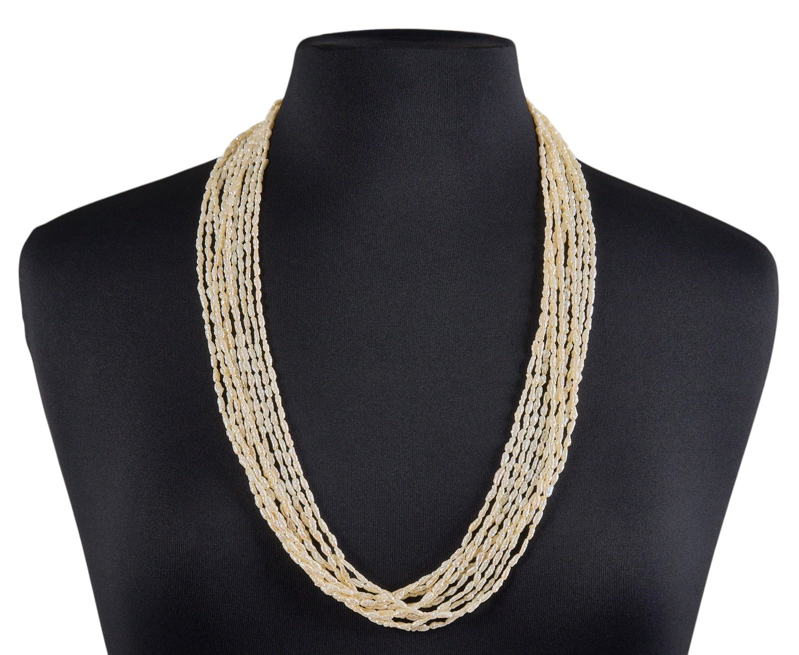 Red McCombs | Multi-Strand Beaded Freshwater Pearl Necklace: Beaded freshwater pearl necklace, composed of ten strands of freshwater pearls and a 14K yellow gold clasp, marked "14K" Length: 30 in. Total weight: 85.1 g Provenance: Property from th
