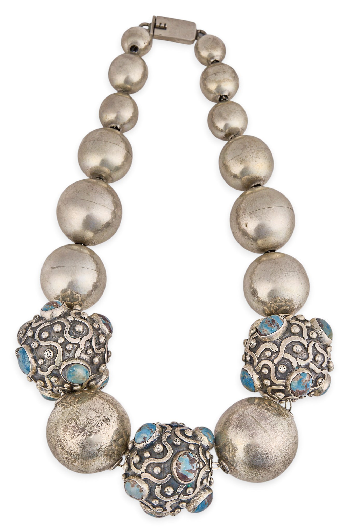 Red McCombs | Mexican Sterling & Turquoise Necklace: Mexican sterling silver graduated necklace, set with turquoise cabochon details and open box clasp, marked "Mexico 925 Sterling" Length: 17 in. Total weight: 159.1 g Provenance: Property fro
