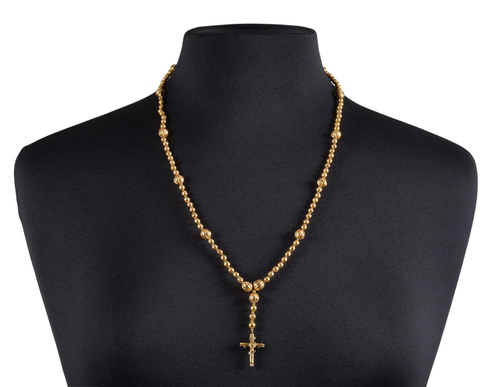 Red McCombs | 14K Hollow Necklace: 14K gold (tested) necklace comprised of hollow links, suspending a central cross pendant Length: 26 in. Total weight: 8.8 g Provenance: Property from the personal estate collection of iconic Texa