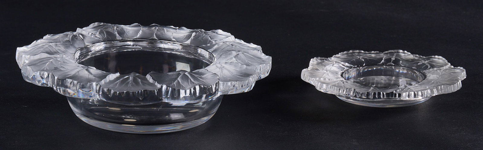 Red McCombs | (2) Lalique Crystal Honfleur Coasters: Two Lalique Crystal Honfleur coasters diameter 8 in. x height 3 in. / largest Provenance: Property from the personal estate collection of iconic Texas businessman, civic leader and philanthropist Bill