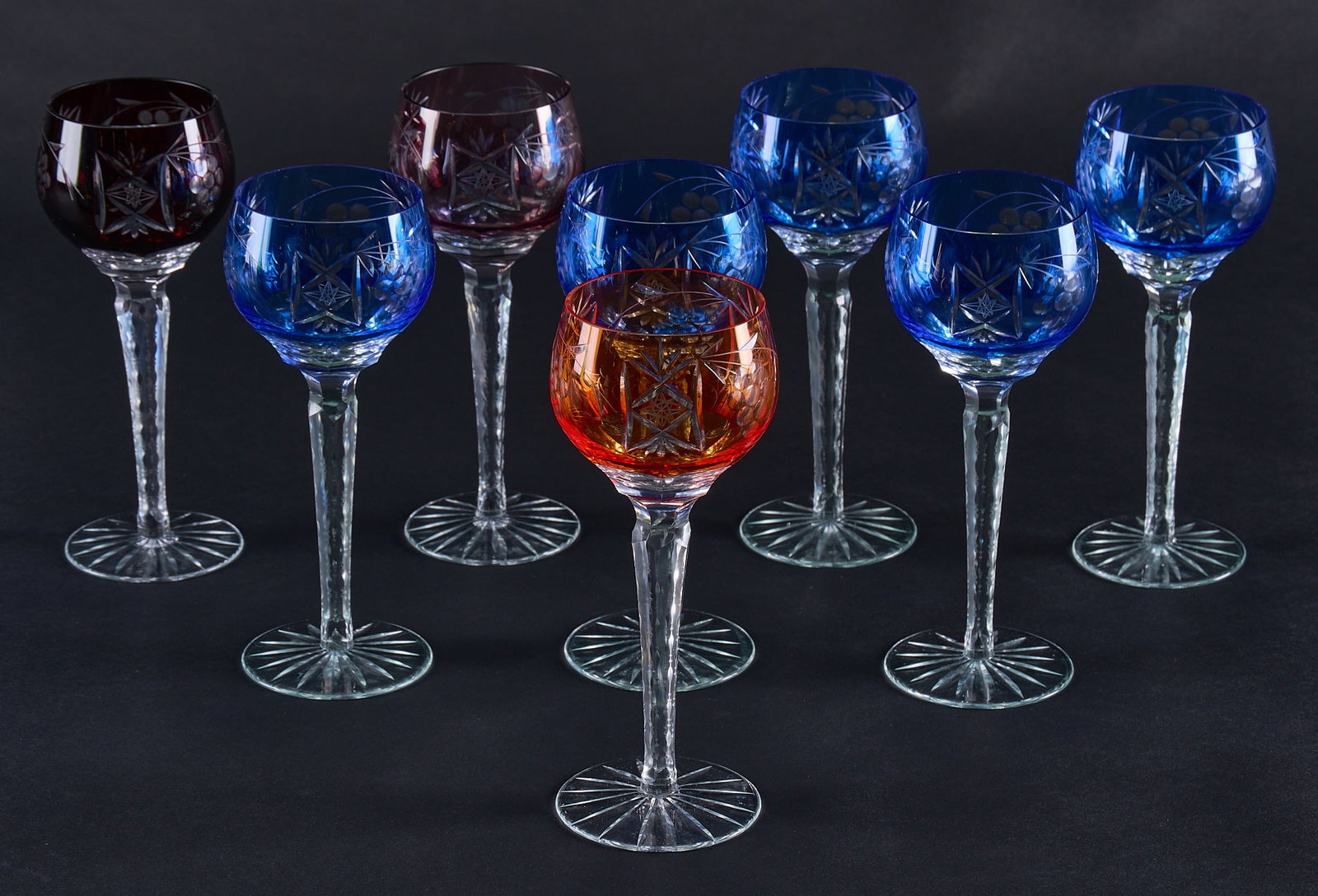 Red McCombs | Collection of (8) Cut-to-Clear Nachtmann Traube Hock Wine Glasses: Collection of eight cut-to-clear Nachtmann "Traube" hock wine glasses, in various colors height 8.25 in. Provenance: Property from the personal estate collection of iconic Texas b