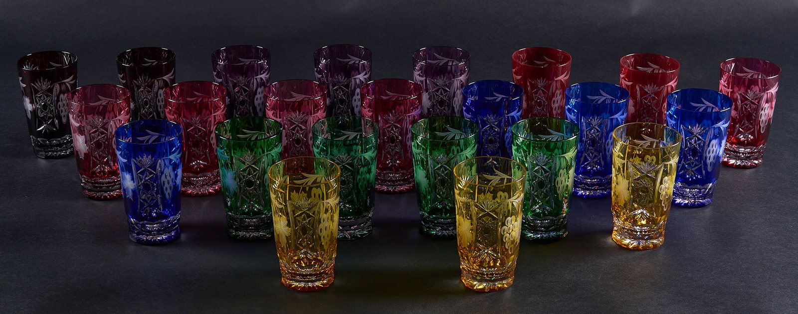 Red McCombs | Collection of (23) Cut-to-Clear Nachtmann Traube Tumblers: Collection of twenty-three cut-to-clear Nachtmann "Traube" tumblers, in various colors height 5 in. / each Provenanc