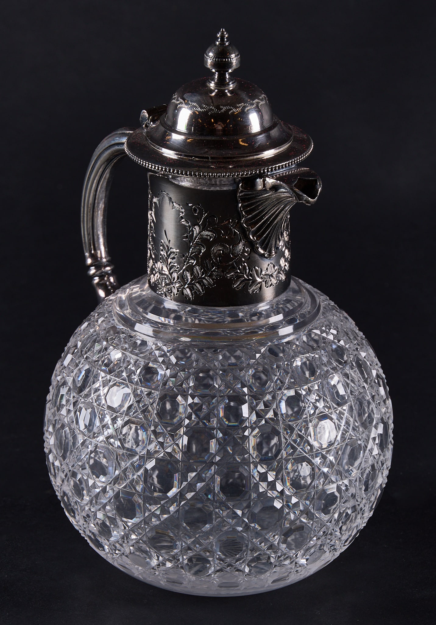 Red McCombs | Victorian Silverplate Crystal Claret Jug: Victorian silverplate crystal claret jug, with diamond cut pattern height 9 in. x width 6 in. x depth 5.5 in. Provenance: Property from the personal estate collection of iconic Texas businessman