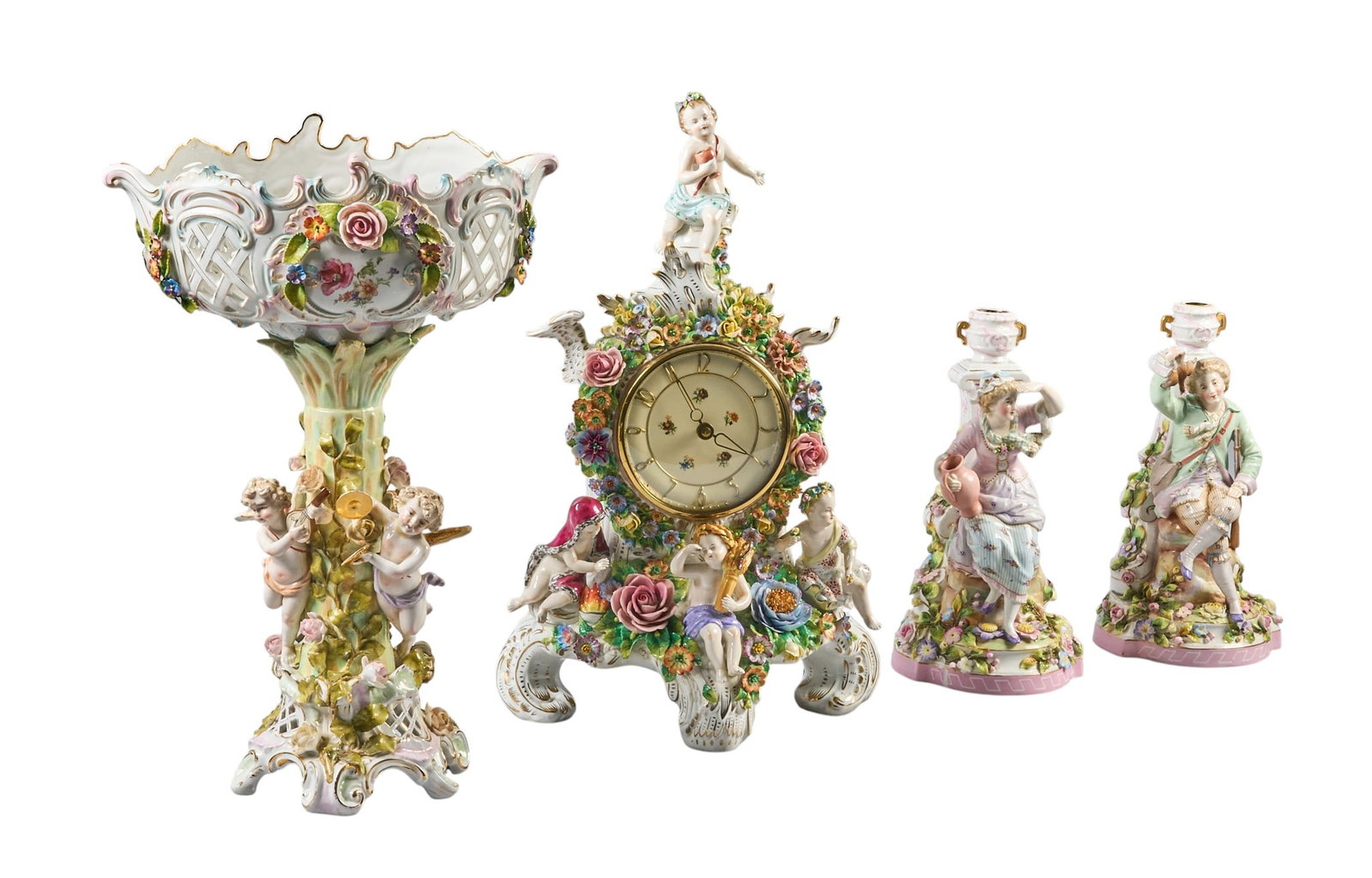 Red McCombs | (4) Rococo Style Porcelain Set: Four piece Rococo style porcelain set, includes compote, mantel clock, and candelabra height 18 in. x width 12 in. x depth 8 in. / largest Provenance: Property from the personal estat