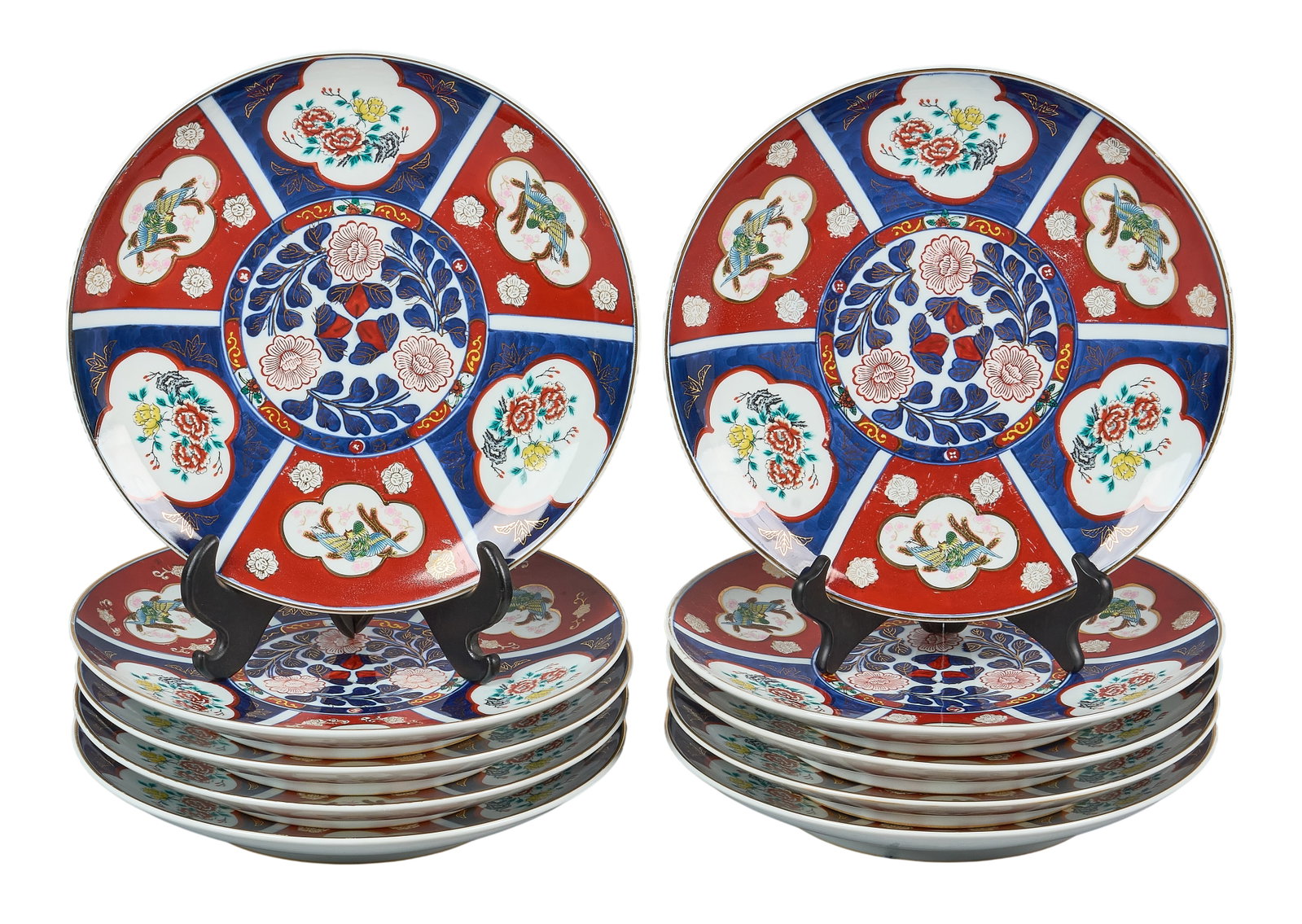Red McCombs | Set of (10) Antique Imari Dinner Plates: Set of ten "Antique Imari" dinner plates, featuring deep red and cobalt blue design, marked "Japan" height 1.75 in. x width 12.5 in. x depth 12.5 in. / each Provenance: Proper