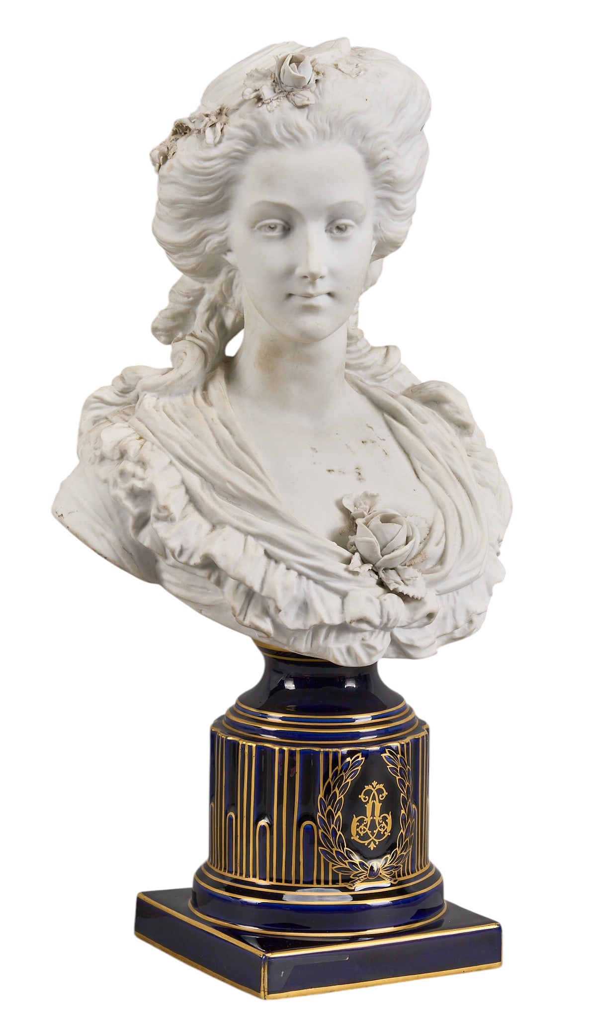 Red McCombs | Sèvres Marie Antoinette Bisque Porcelain Bust: The Manufacture Nationale de Sèvres (France) bisque porcelain bust depicting Queen of France Marie Antoinette, modeled after a marble original by Felix Lecomte, attached to cobalt blue glazed p