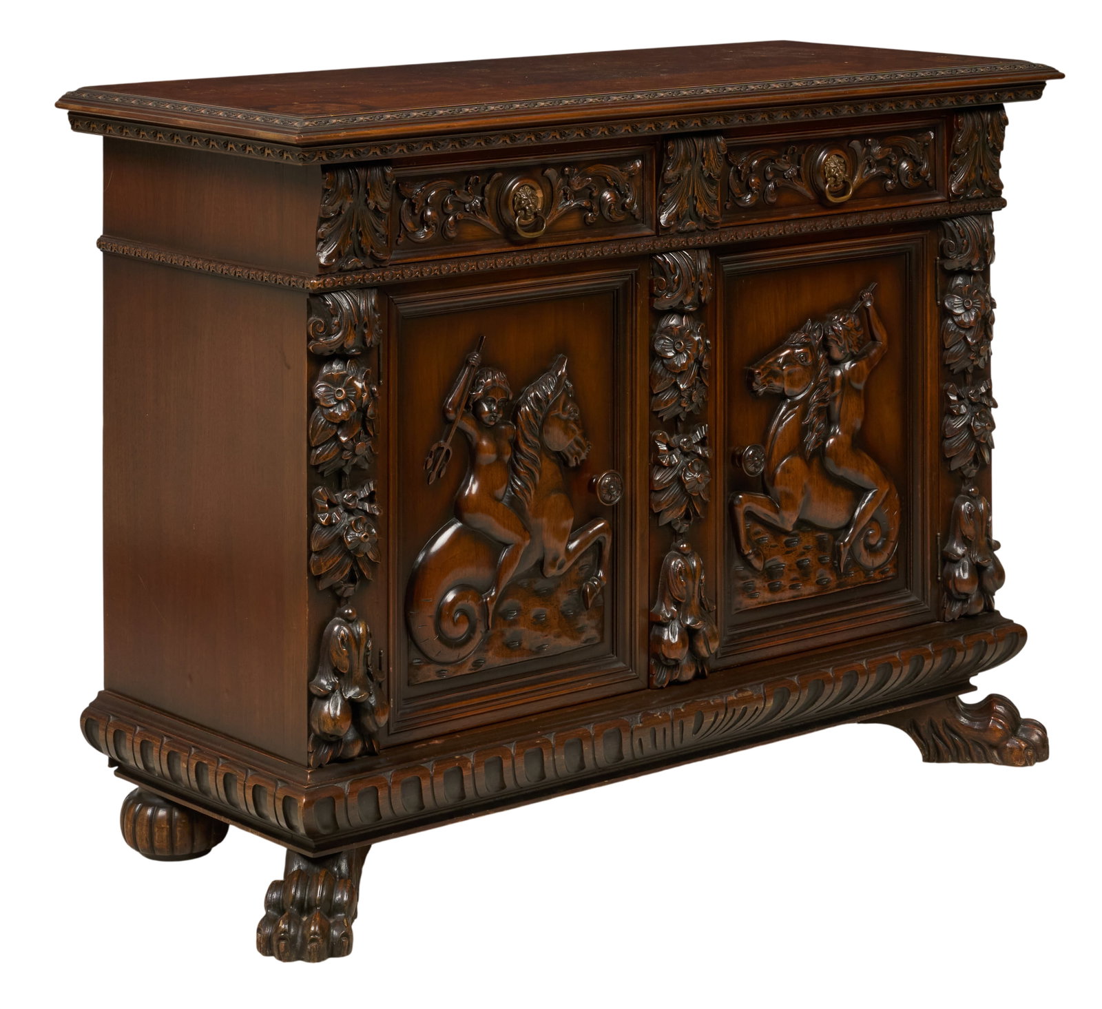 Red McCombs | Italian Renaissance Revival Cabinet: Italian Renaissance Revival carved cabinet, rectangular top, two drawers, and two paneled doors deeply carved in relief with mounted classical warriors, lion mask ring pulls, three internal drawers, p