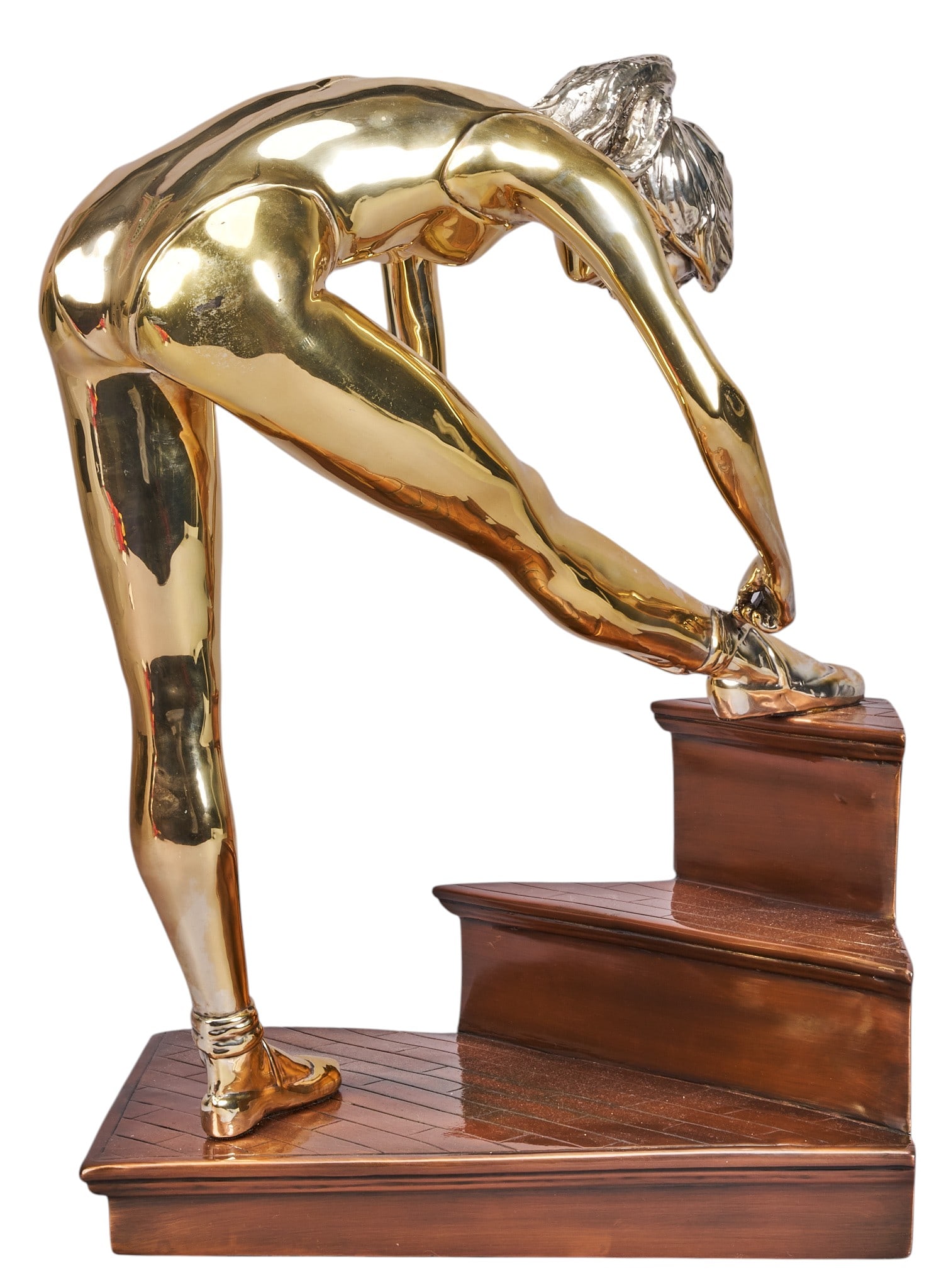 Red McCombs | Federico Cardona, Ballerina Sculpture: Federico Cardona Amezcua (Mexico, b. 1951) for D'Argenta, highly polished gold finished metal sculpture of a ballerina stretching atop a copper-finish metal stepped platform,