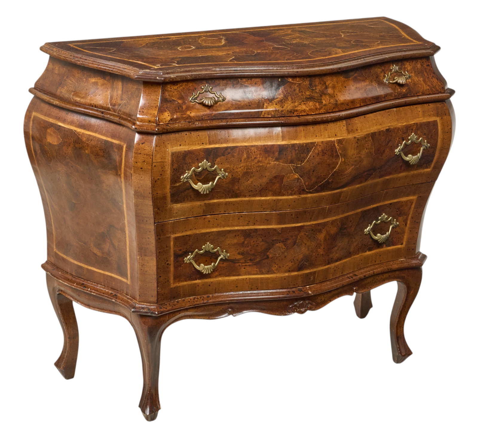 Red McCombs | Bombe Commode: Baroque-style burl wood commode, shaped and line-inlaid top over three drawers, brass hardware, shaped sides and scalloped apron, cabriole legs height 32 in. x width 39 in. x depth 17 in. 