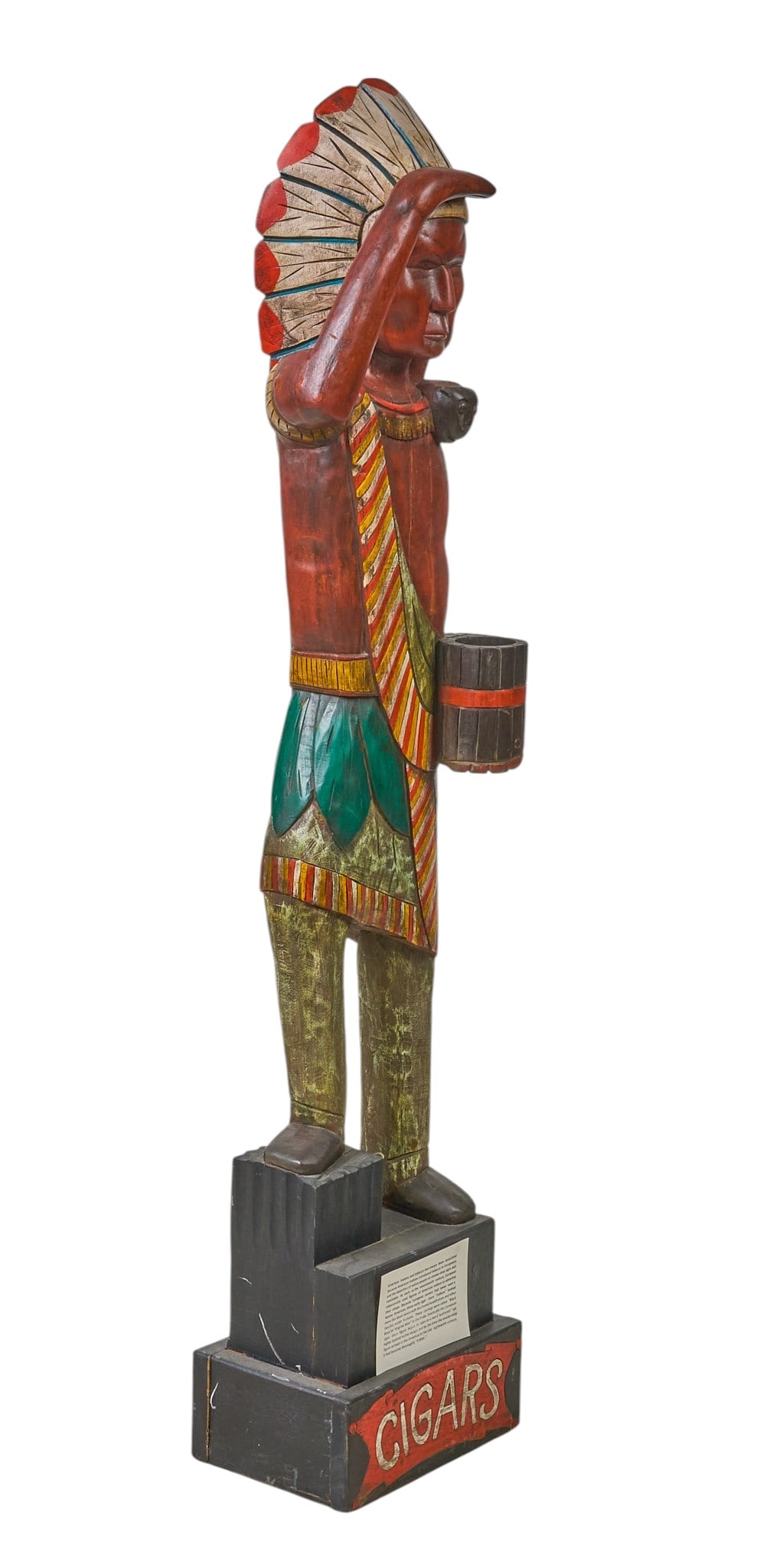 Red McCombs | Vintage Cigar Store Indian: Hand-painted and carved cigar store sculpture depicting American Indian height 66 in. x width 17 in. x depth 10 in. Provenance: Property from the personal estate collection of iconic Texas