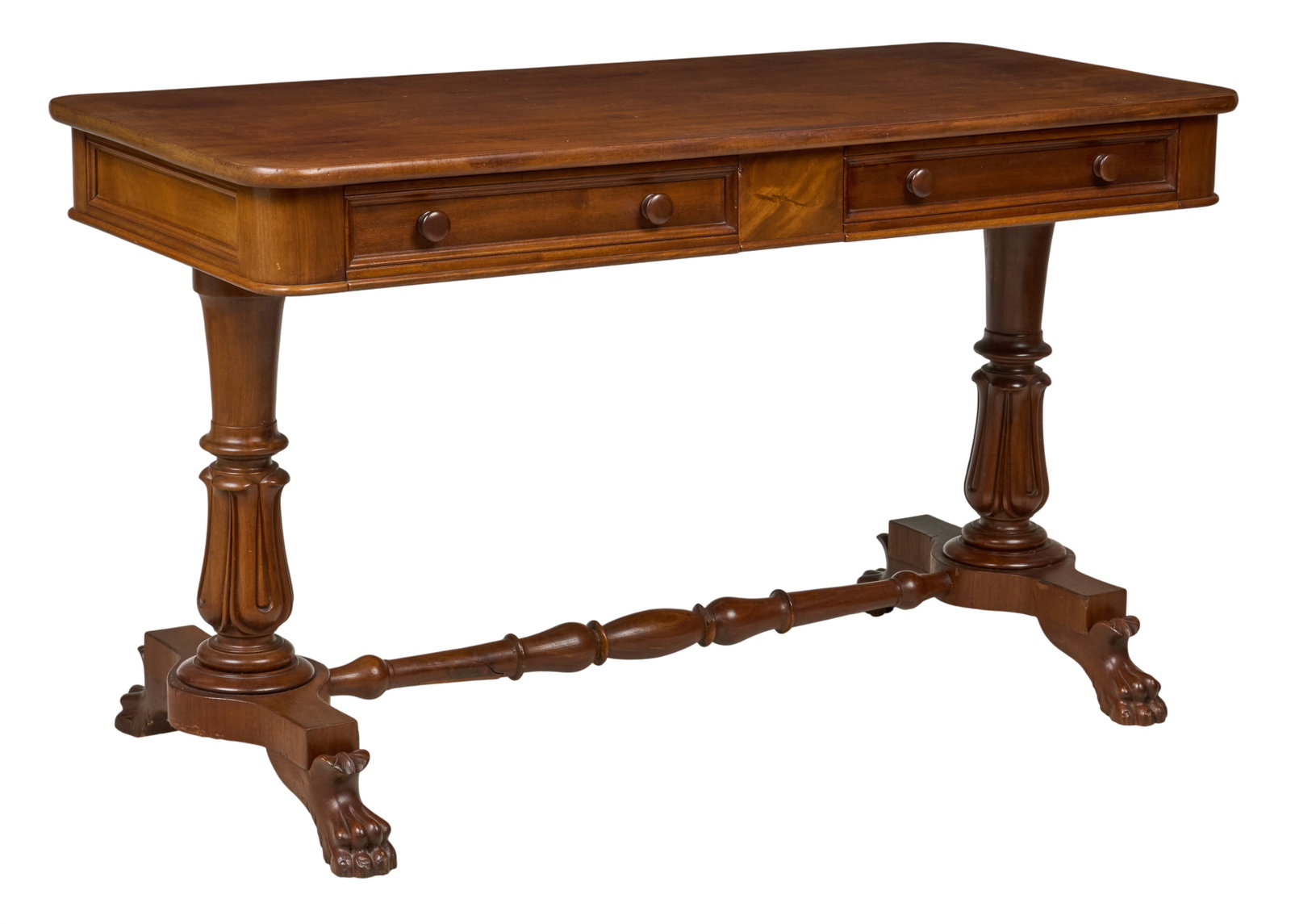 Red McCombs | Victorian Library Table: Victorian library table with two drawers and carved trestle legs ending in lion paws height 29 in. x width 49.5 in. x depth 23 in. Provenance: Property from the personal estate collection of iconic Te