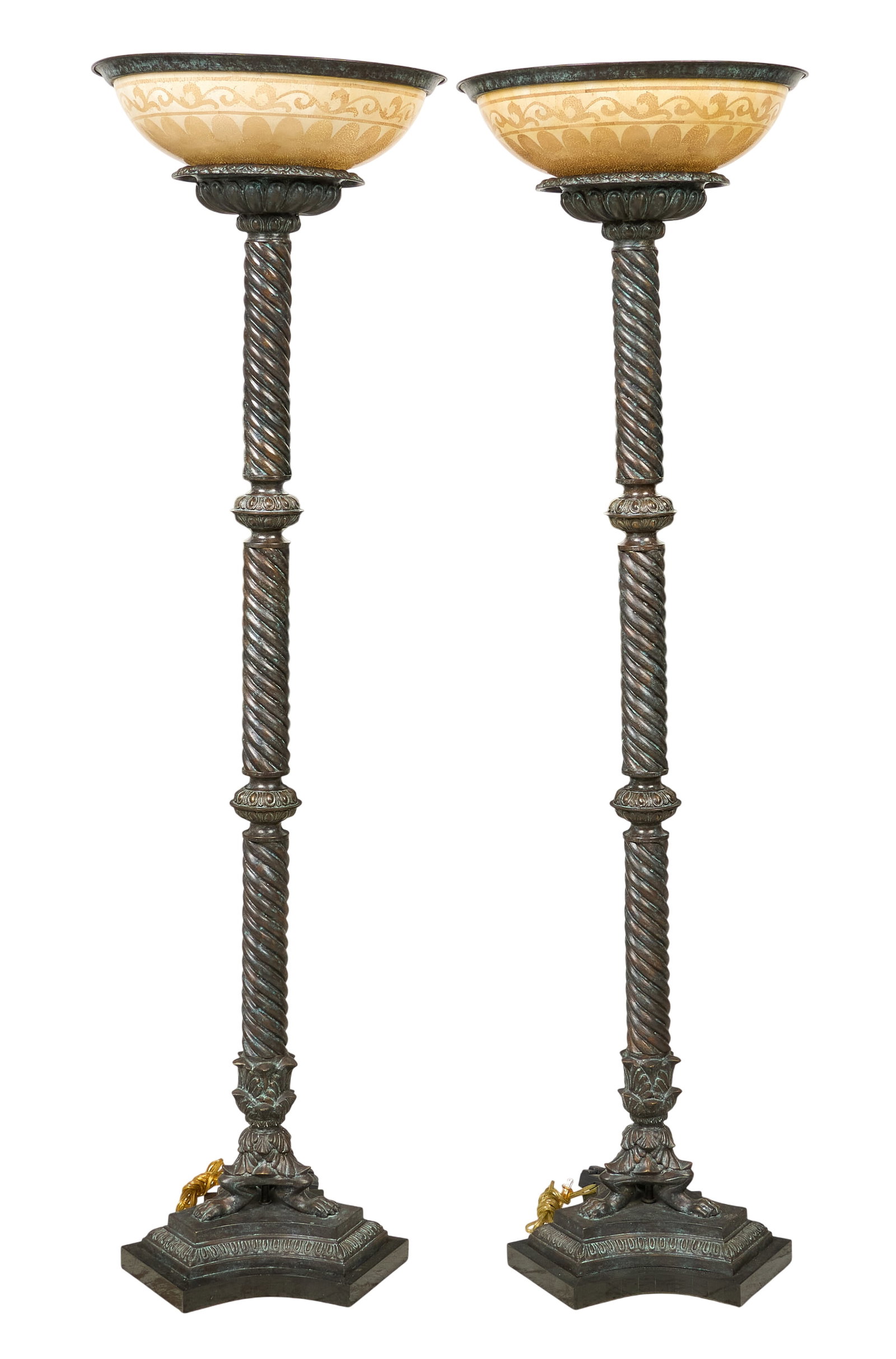 Red McCombs | Pair of Torchiere Floor Lamps: Pair of metal torchiere floor lamps with spiral columns and black marble bases, in working condition height 72.5 in. x width 20.5 in. x depth 20.5 in. / each Provenance: Property from the