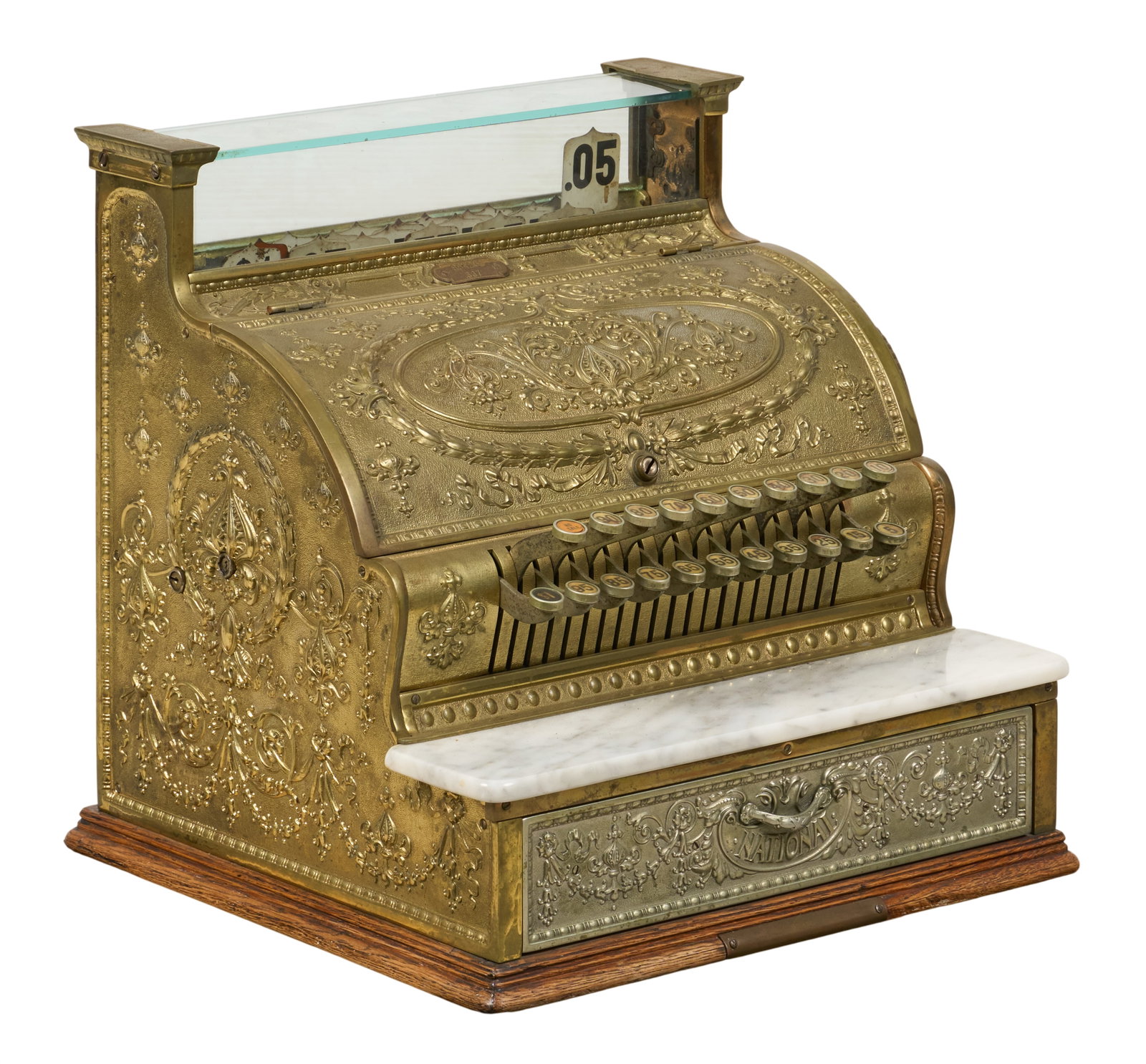 Red McCombs | National Cash Register: Vintage National Cash Register (NCR), model 337, circa 1913, serial no. 384290, with repousse brass frame and marble plate above cash drawer height 17 in. x width 19 in. x depth 16.5 in. 