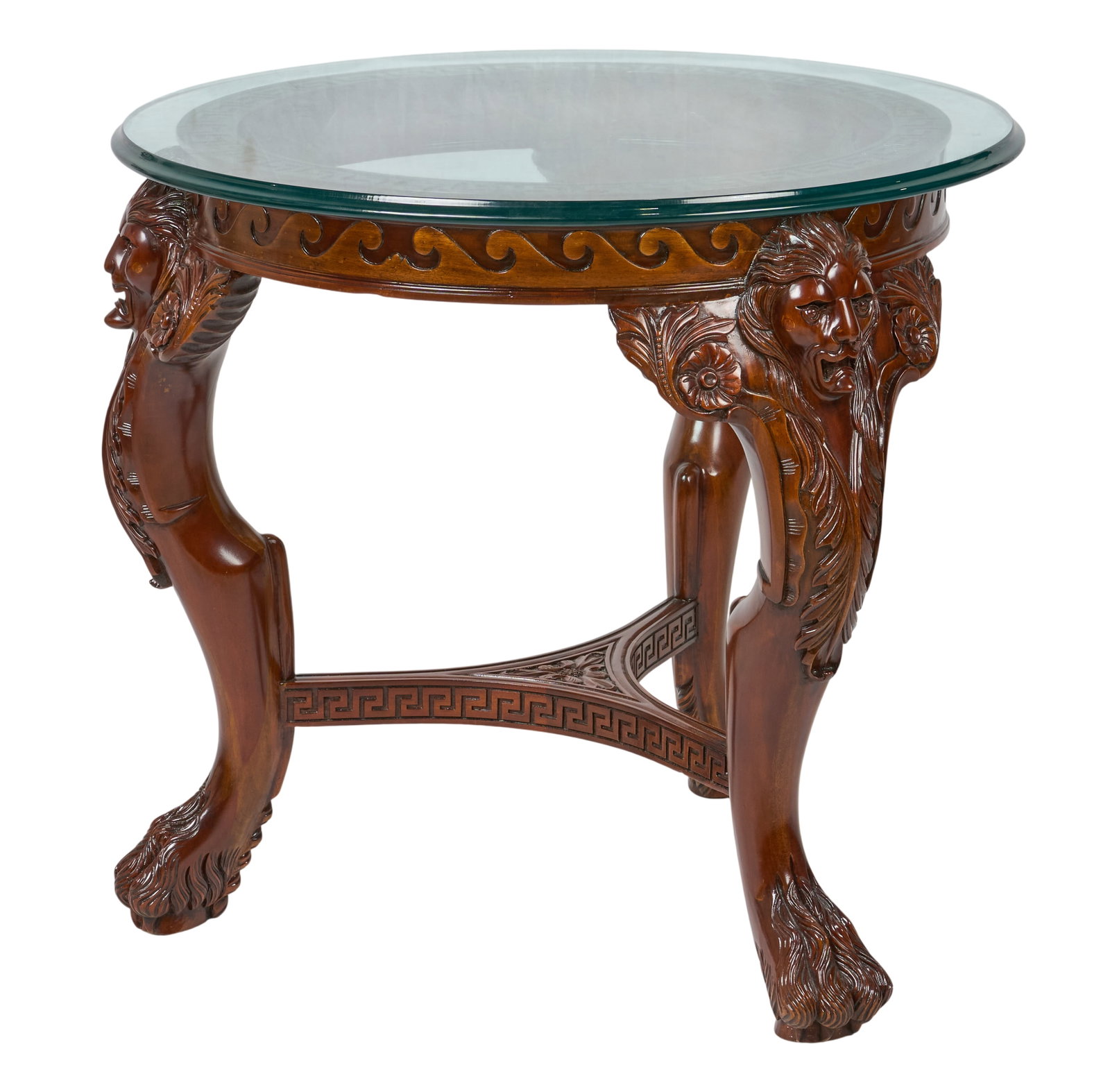 Red McCombs | Vintage Empire Style Side Table: Vintage Empire style wooden side table with glass top, decorated with lion carvings on knees ending on claw feet and Classical pattern on stretcher, circa 20th century height 30 in. x width 33