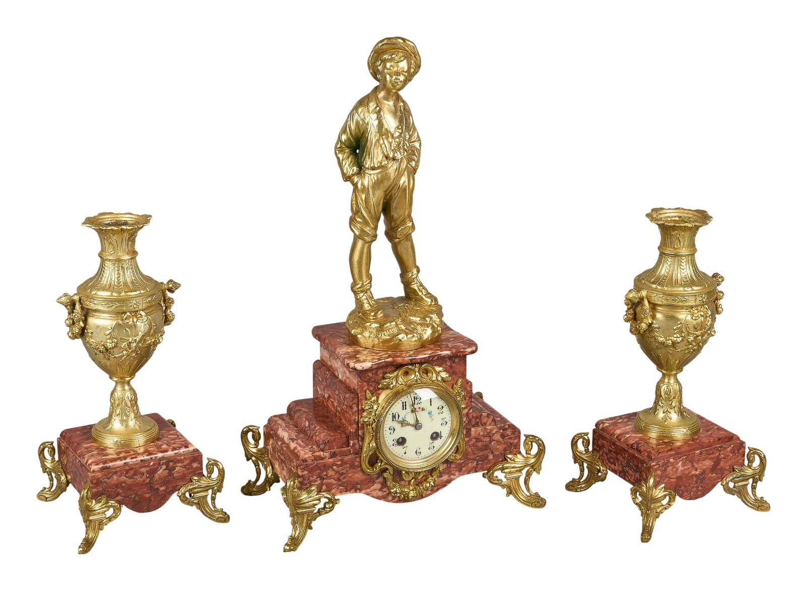 Red McCombs | Louis XVI Clock Garniture: French Louis XVI-style three-piece clock garniture, late 19th century, comprising mantel clock and pair of matching urns, the clock with gilt bronze classical figure surmount above a variegated rouge