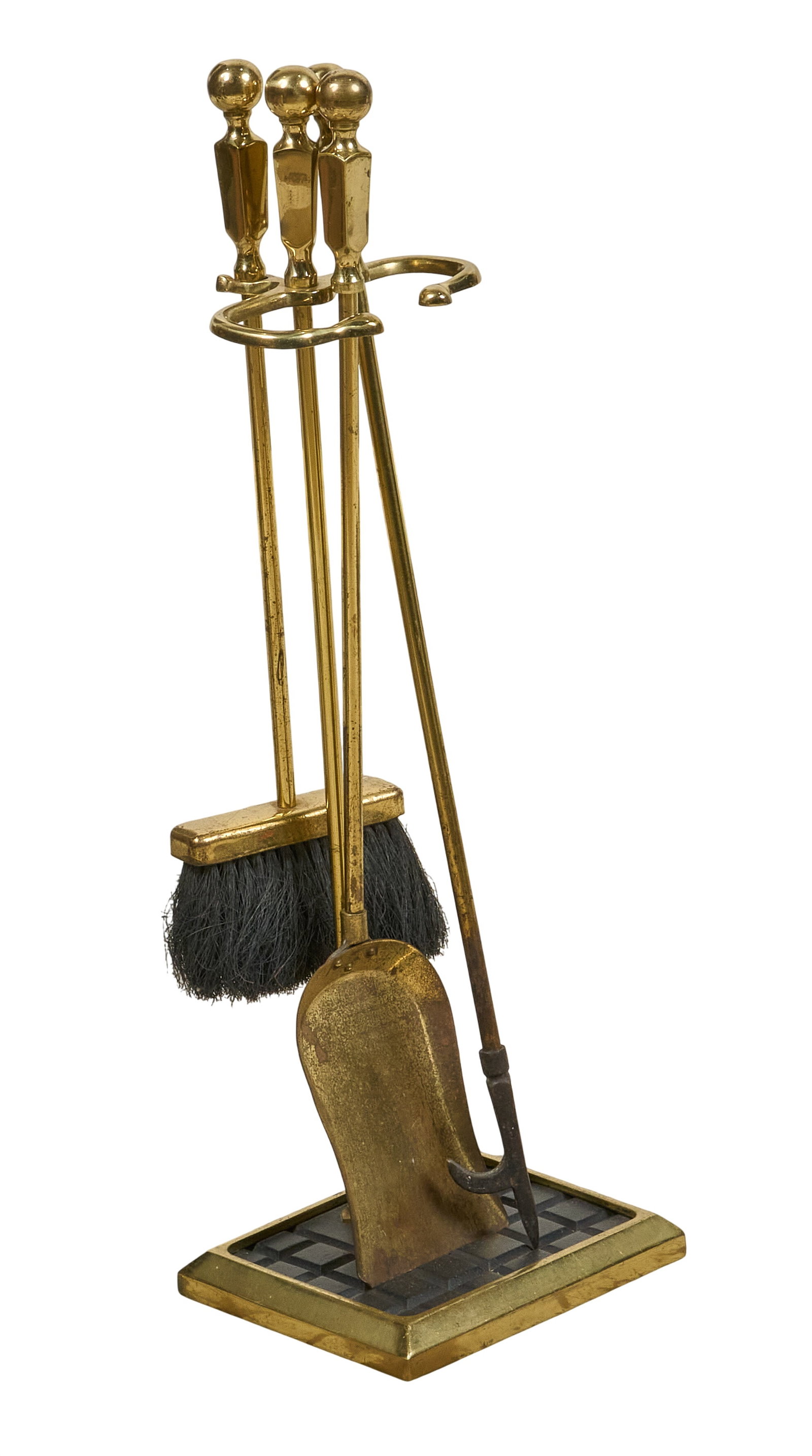Red McCombs | Vintage Brass Fireplace Tool Set: Vintage brass fireplace tool set with stand, shovel, poker, and broom height 27 in. x width 9.5 in. x depth 7.5 in. Provenance: Property from the personal estate collection of iconic Texas busin