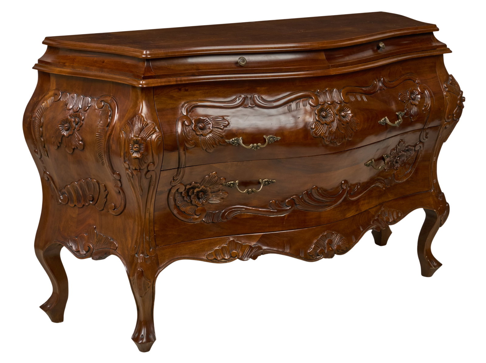 Red McCombs | Vintage Bombe Chest: Vintage bombe chest decorated with carved floral motifs, supported on cabriole legs, circa early 20th century height 32 in. x width 57 in. x depth 21 in. Provenance: Property from the personal estate 