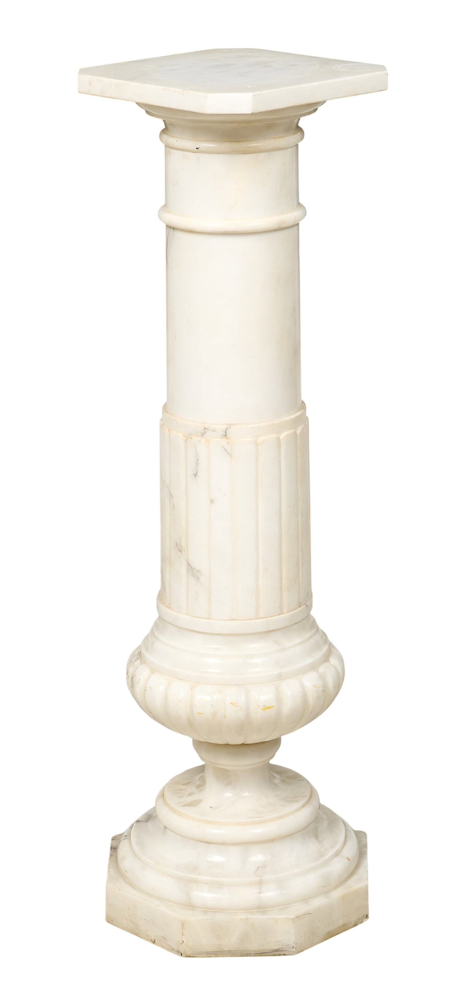 Red McCombs | White Marble Pedestal: White marble pedestal with fluted decoration height 42 in. x width 13.5 in. x depth 13.5 in. Provenance: Property from the personal estate collection of iconic Texas businessman, civic leader