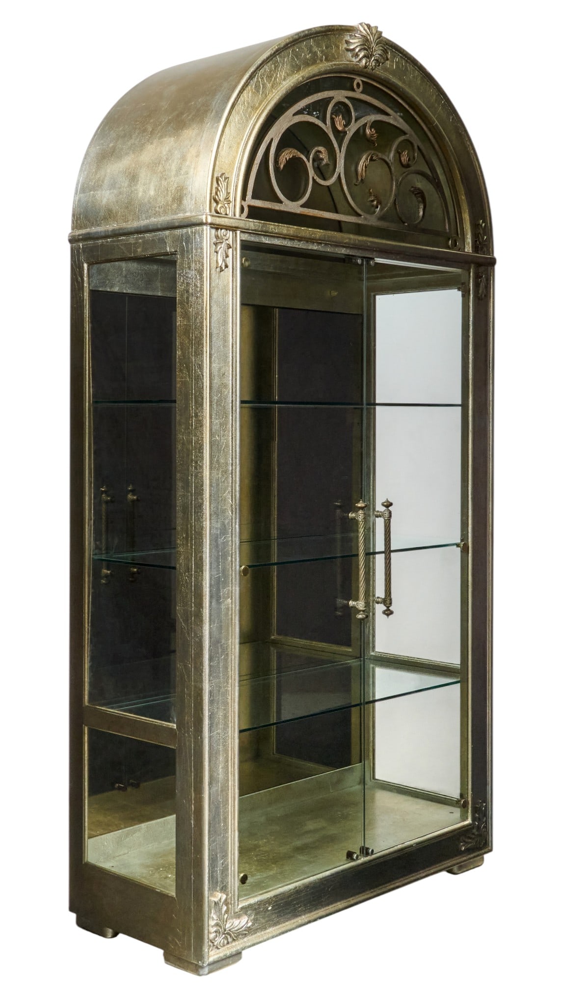 Red McCombs | Henredon Arched Curio Cabinet: Henredon arched curio cabinet with silver-gold finish, ornate scrollwork decoration, mirrored back, and adjustable glass shelves height 94 in. x width 46 in. x depth 23.5 in. Provenance: Property