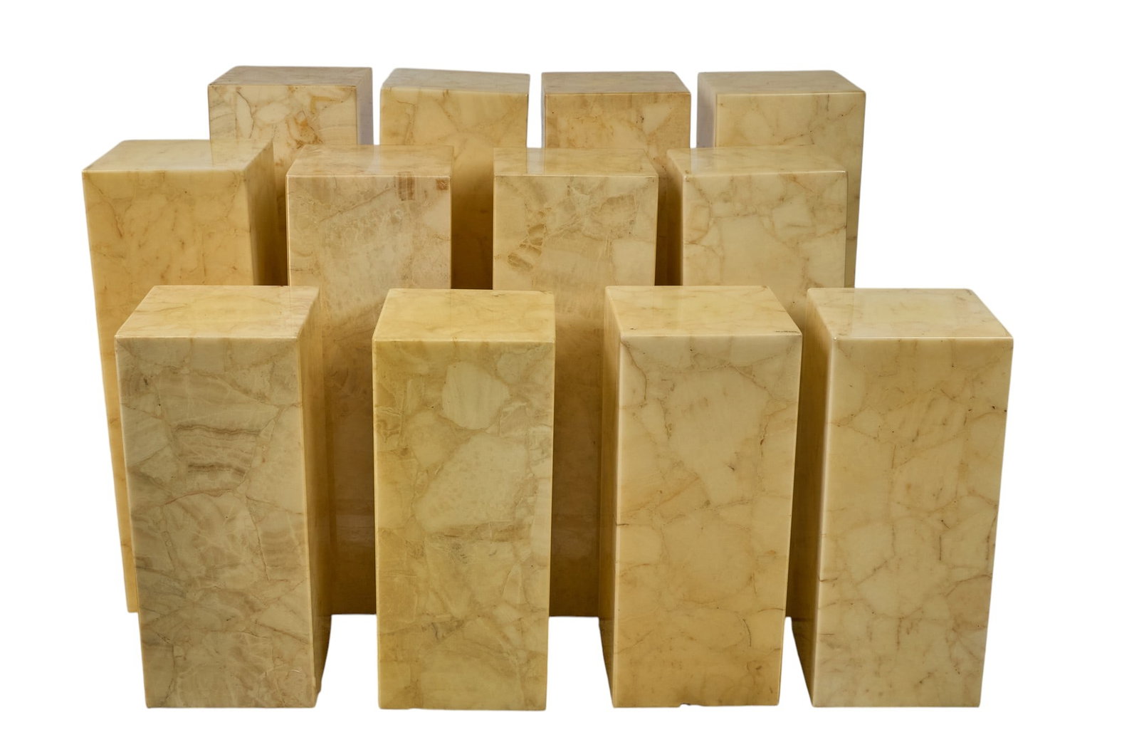 Red McCombs | Set of (12) Muller's Onyx Lights: Set of twelve Muller's onyx lights, of various sizes, marked "Hecho en Mexico" height 39.5 in. x width 12 in. x depth 12 in. / largest Provenance: Property from the personal estate 