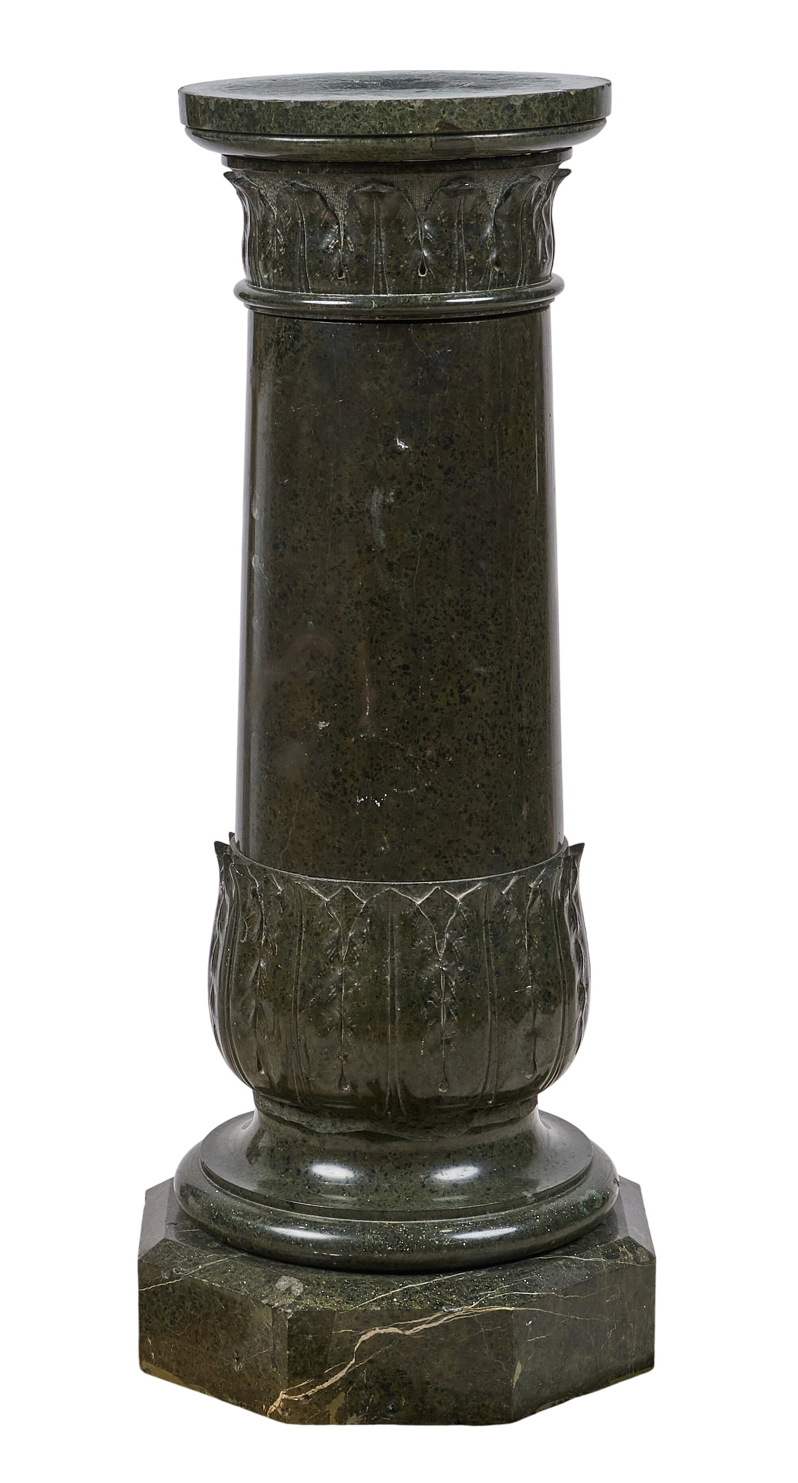 Red McCombs | Green Marble Pillar: Green marble pillar, with leaf-carved motifs, on octagonal plinth base height 39.5 in. x width 16 in. x depth 16 in. Provenance: Property from the personal estate collection of iconic Texas