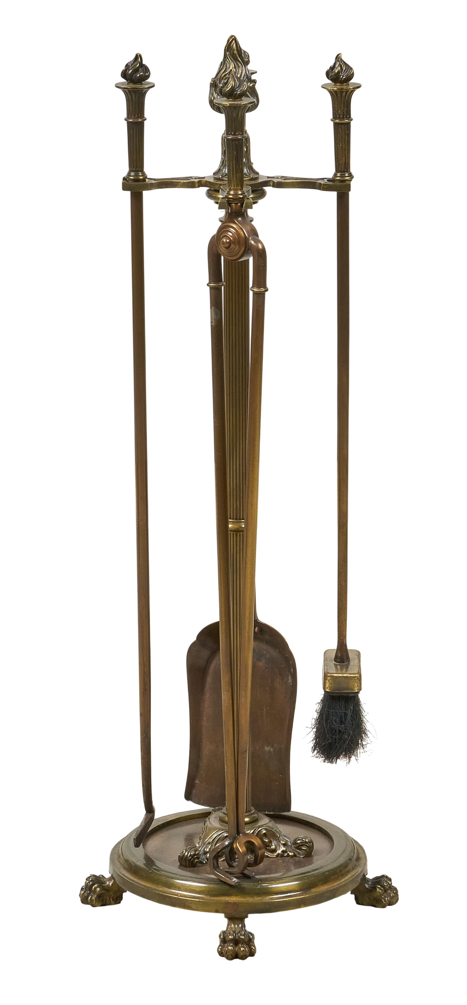 Red McCombs | Brass Fireplace Set: Brass fireplace tool set to include a stand with decorative finials, a shovel, a brush, tongs, and a poker height 36 in. x diameter 13 in. / largest Provenance: Property from the personal estate colle