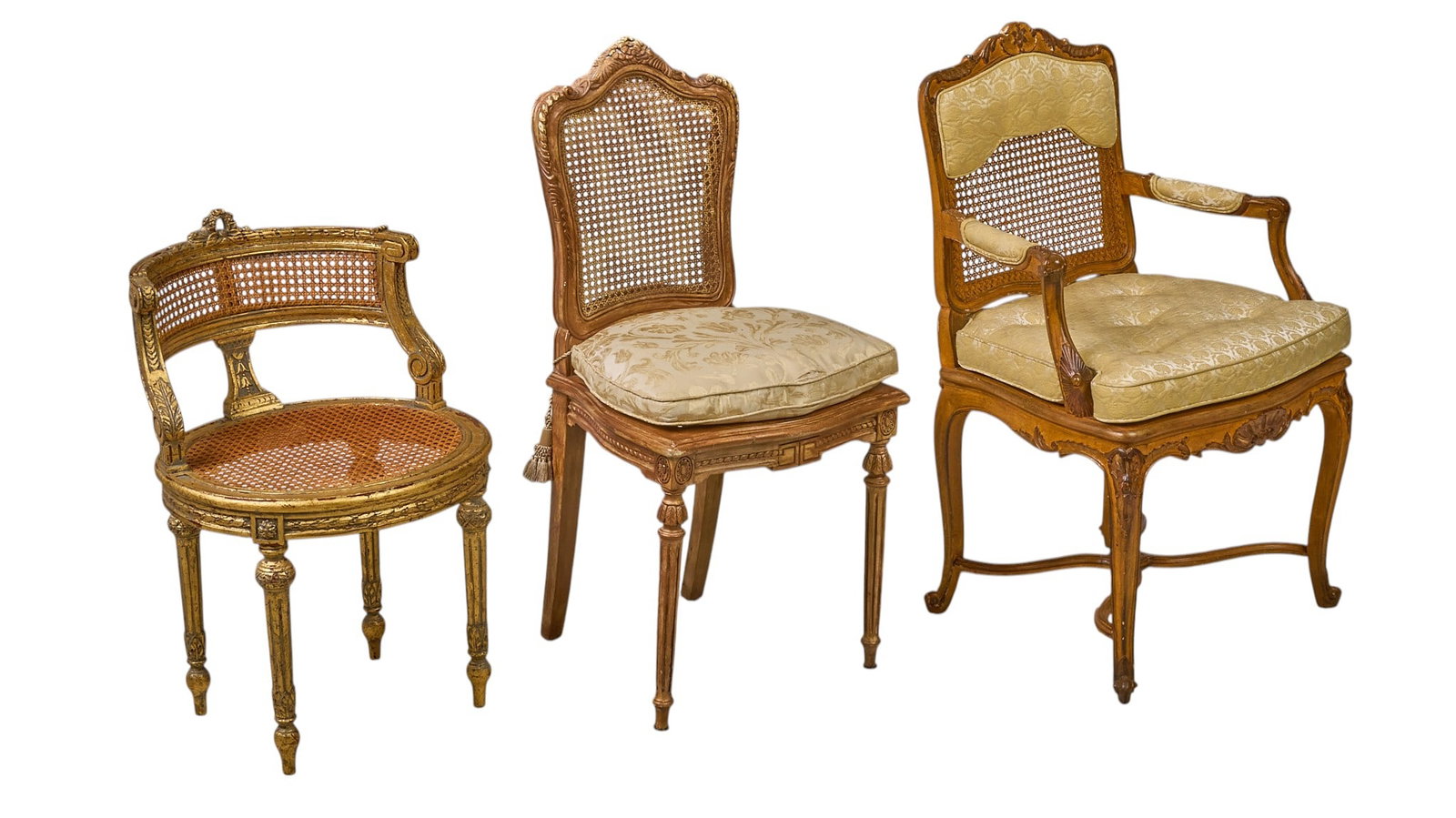 Red McCombs | (3) Antique French Cane-Back Chairs: Three assorted antique French Rococo style cane-back chairs, includes one with curved back, fluted legs, and gilded finish, one taller, slender chair with carved trim and seat cushion, and one Louis X
