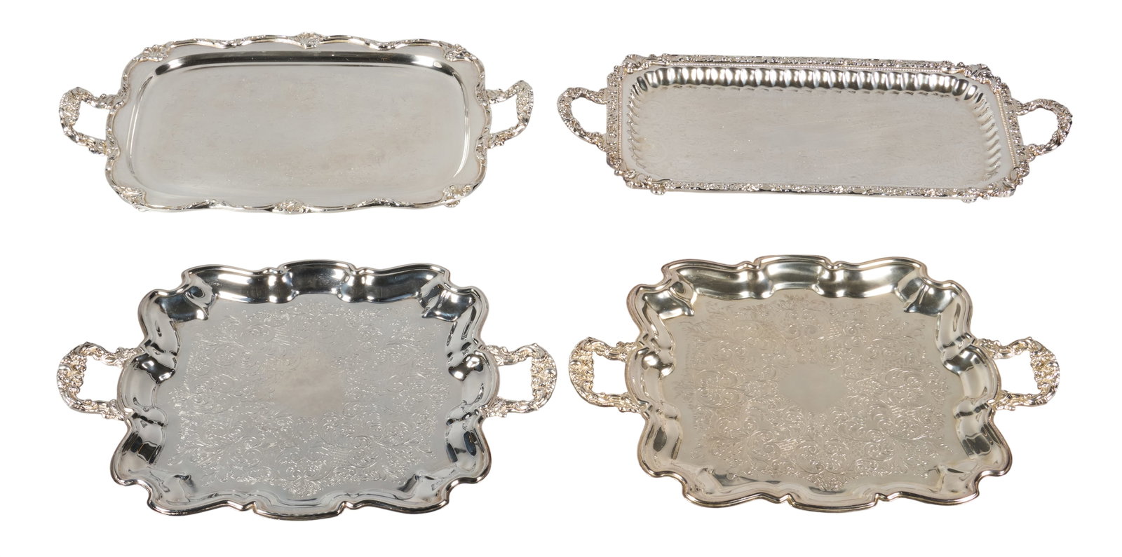 Red McCombs | (4) Vintage Silverplate Service Trays: Four vintage silverplate service trays, each featuring repousse handles, some with scalloped edges height 10 in. x width 22 in. x depth 14 in. / largest Provenance: Property from the pe