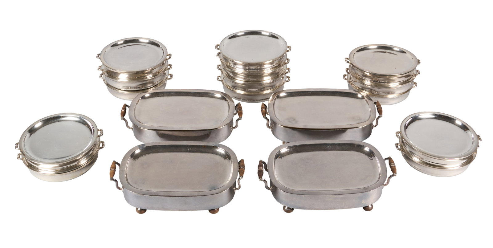 Red McCombs | Collection of Antique Warming Dishes: Collection of antique silverplate warming dishes, featuring four late Georgian examples, with wooden bun feet and tin lining height 3.5 in. x width 14 in. x depth 8.5 in. / largest