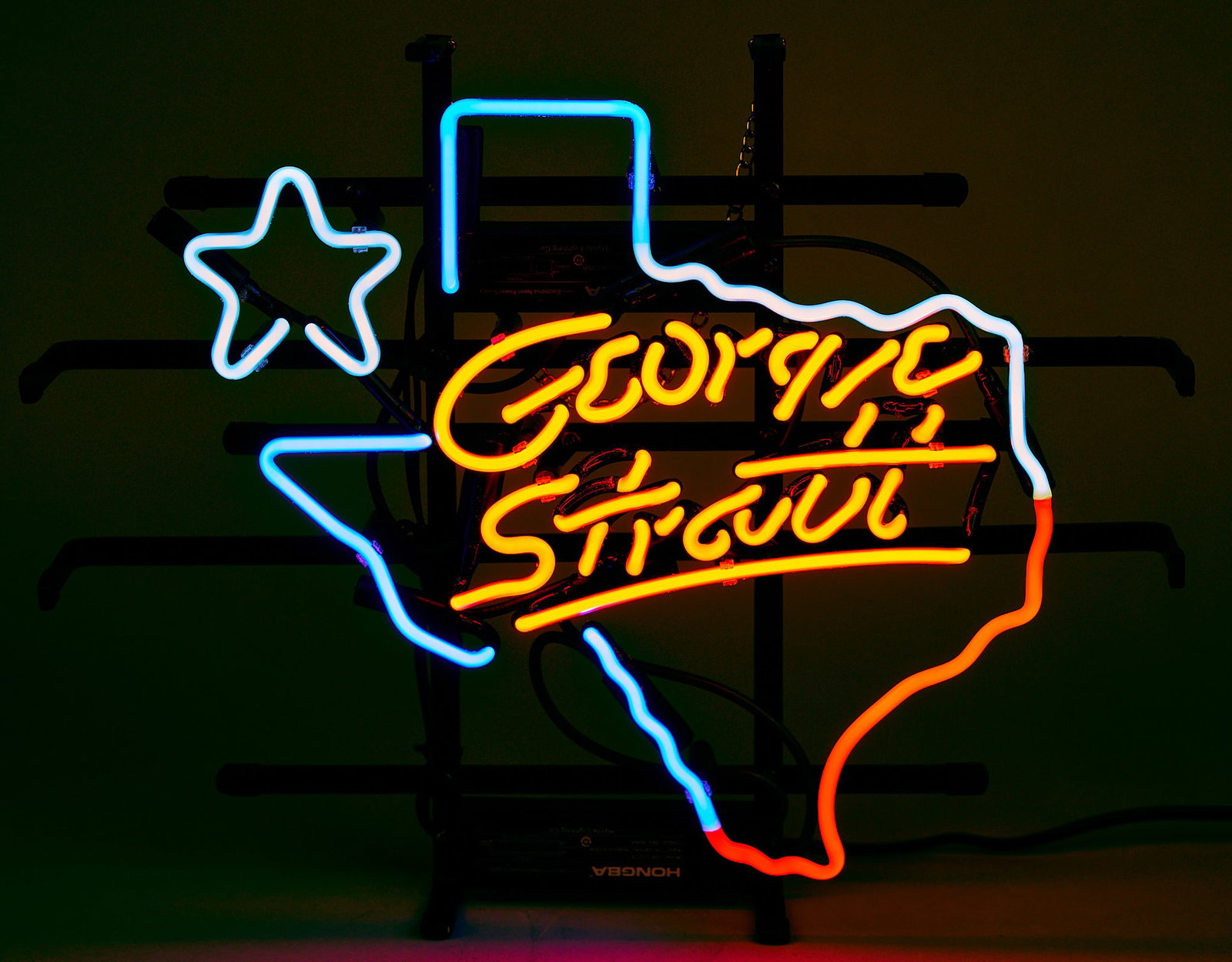 Small George Strait Texas Neon Sign: Small George Strait Texas neon sign, in working condition, circa 21st century height 13 in. x width 16 in. x depth 3 in. Provenance: Property from a home in Boerne, Texas 