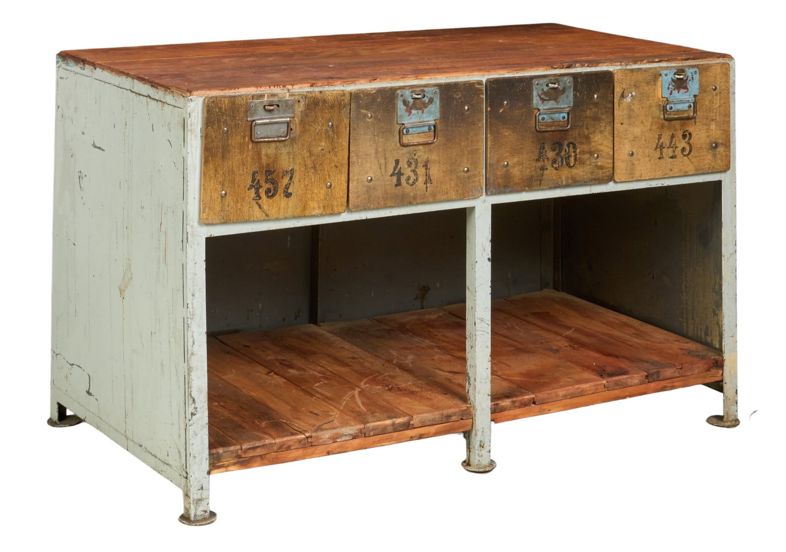 Industrial Counter: Industrial table with wood, iron, and steel construction, featuring three drawers height 33 in. x width 55 in. x depth 30.5 