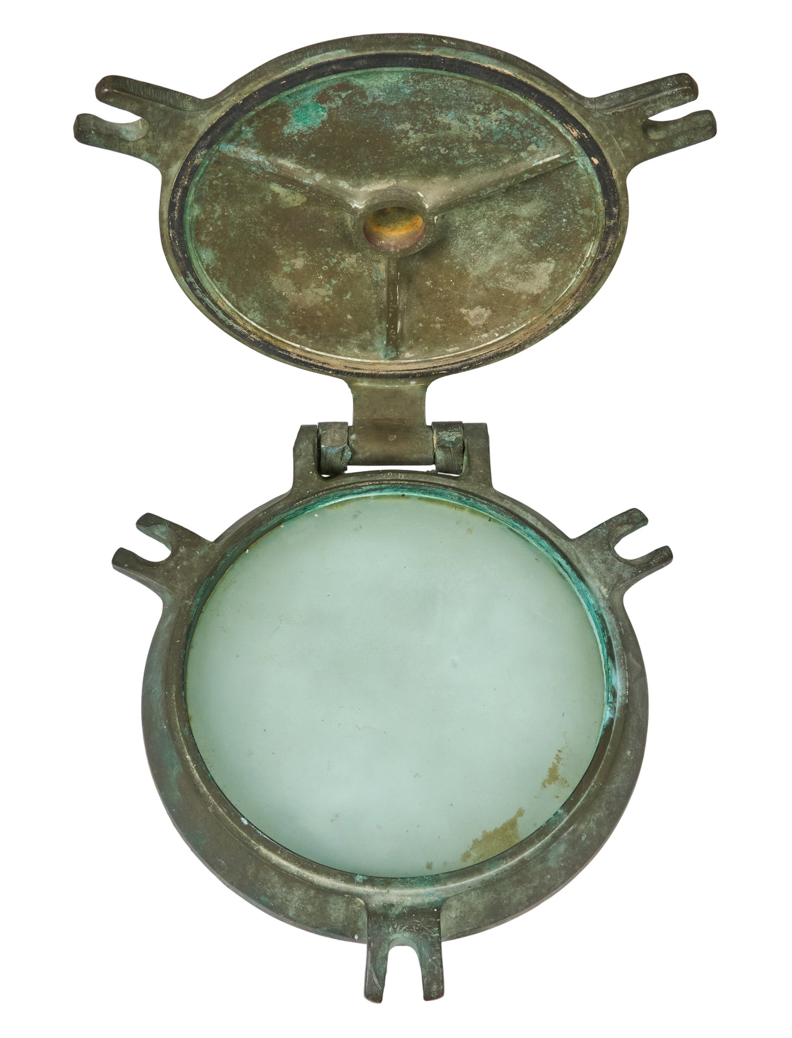 Antique Porthole: Antique bronze ship's porthole with hinged storm cover and aged green patina height 3 in. x width 17 in. x depth 18 in. Provenance: Property from a home in Boerne, Texas