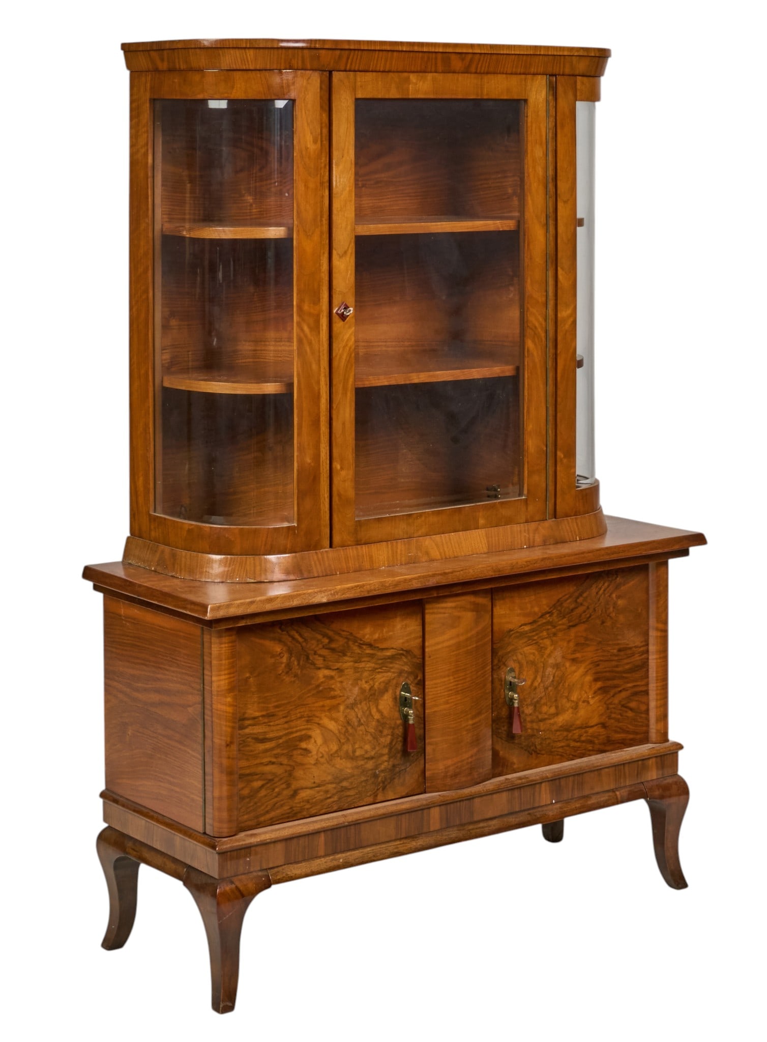 Two-Piece Highboard Cabinet: Two-piece walnut veneered highboard cabinet with top section featuring glass-front door, curved glass sides, and shelving, supported on base cabinet with two doors and interior shelves, includes three
